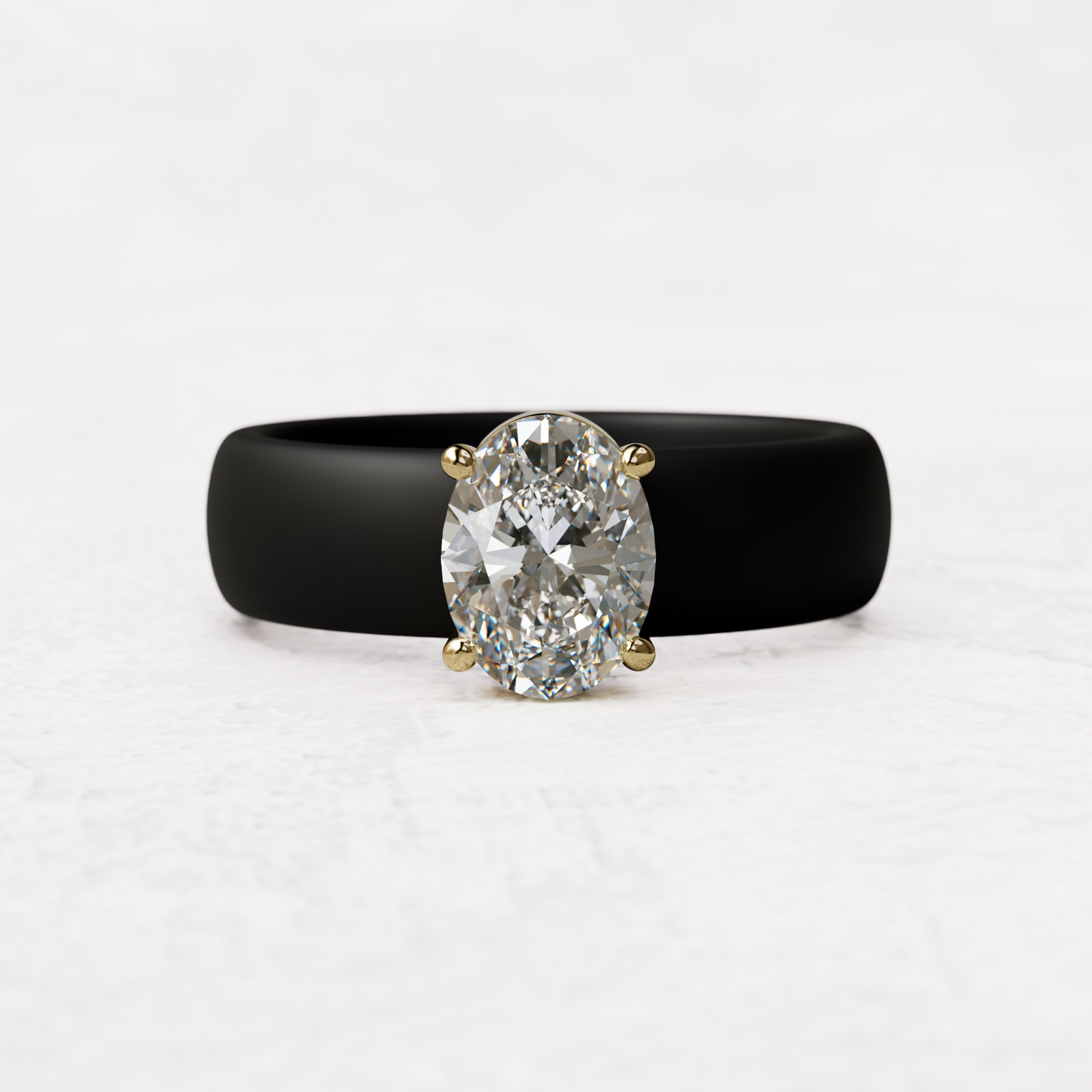 One carat oval diamond with black silicone band in 14 karat gold