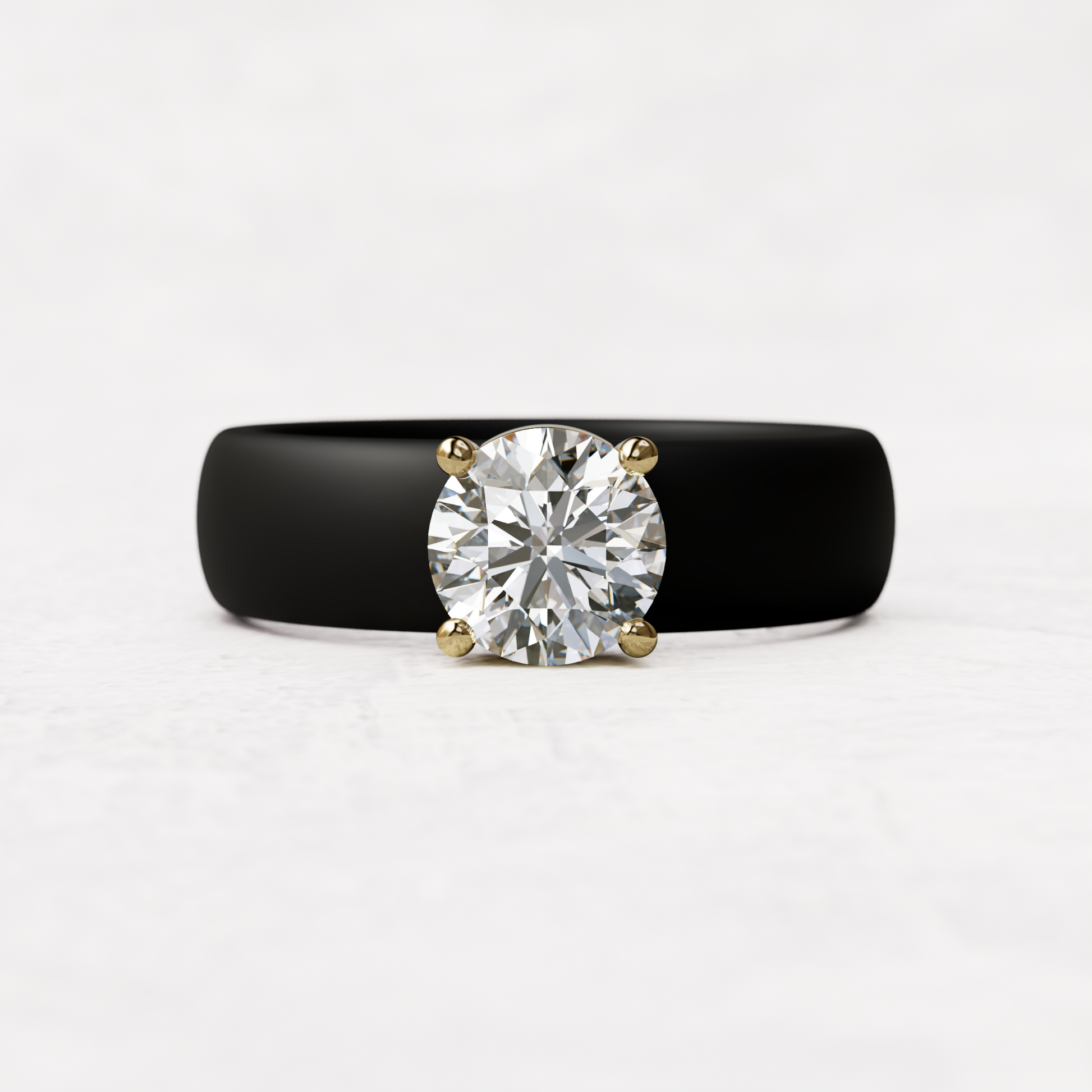 Black silicone ring with a one carat round moissanite set in 14 karat gold