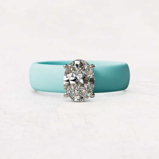 One carat oval diamond with aqua silicone band in 14 karat white gold