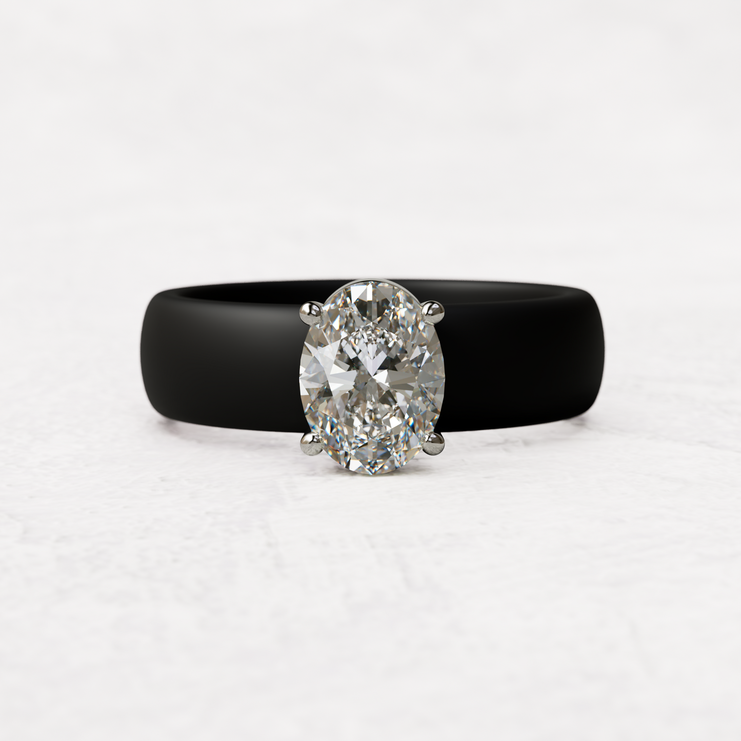 One carat oval diamond with black silicone band in 14 karat white gold