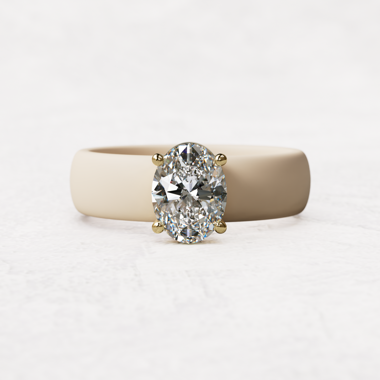 One carat oval diamond with nude silicone band in 14 karat gold