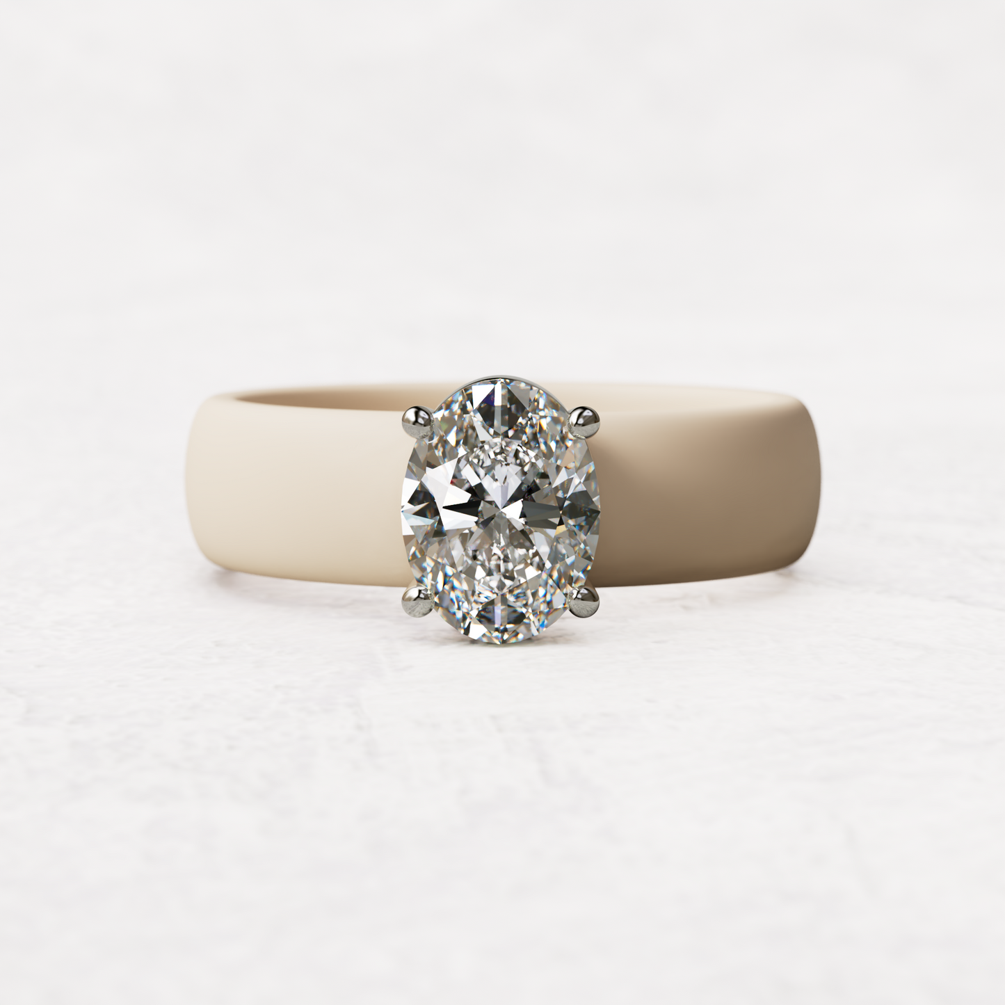 One carat oval diamond with nude silicone band in 14 karat white gold