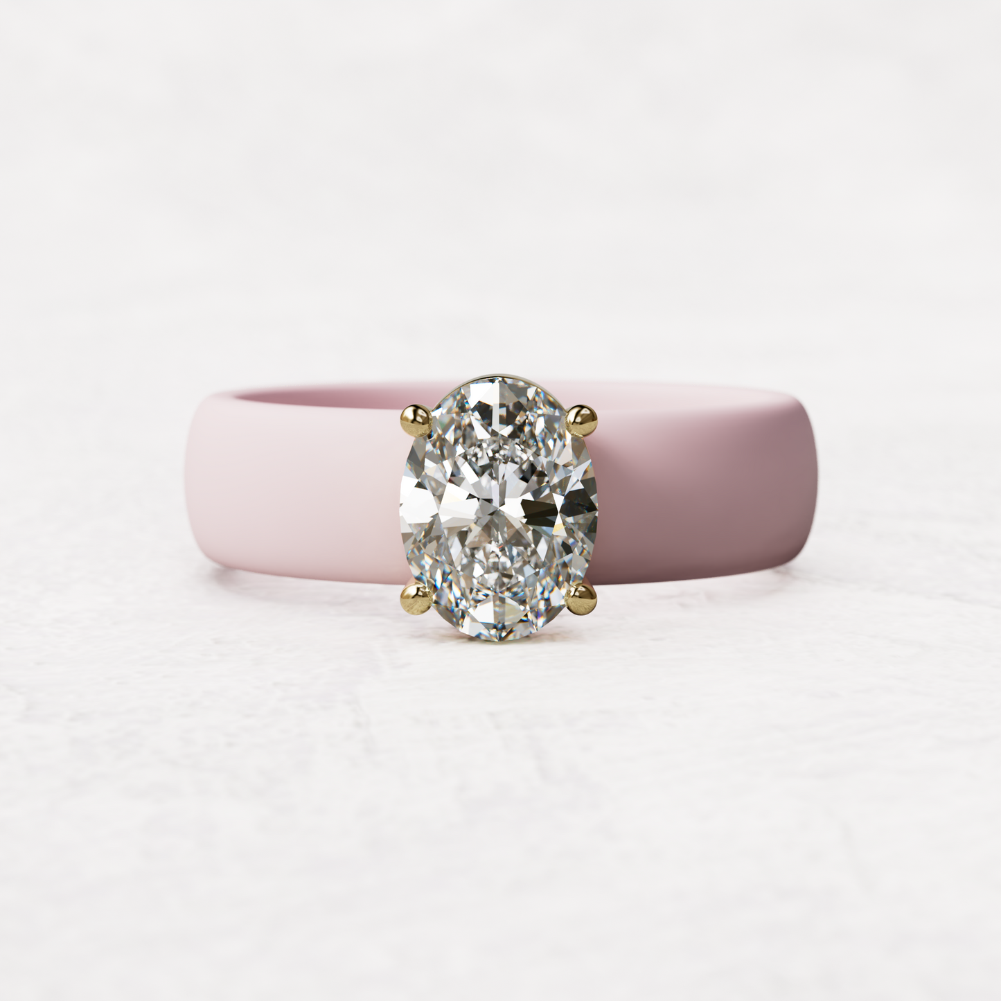 One carat oval diamond with pink silicone band in 14 karat gold
