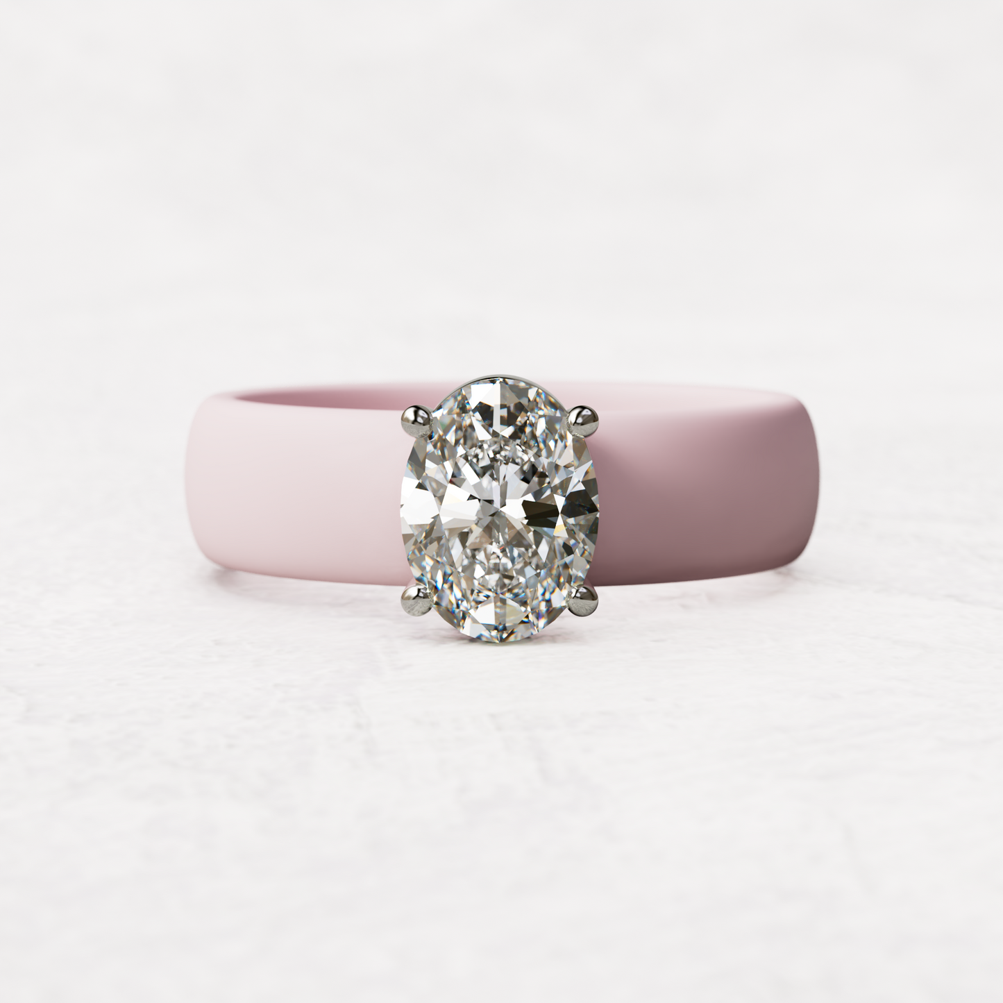 One carat oval diamond with pink silicone band in 14 karat white gold