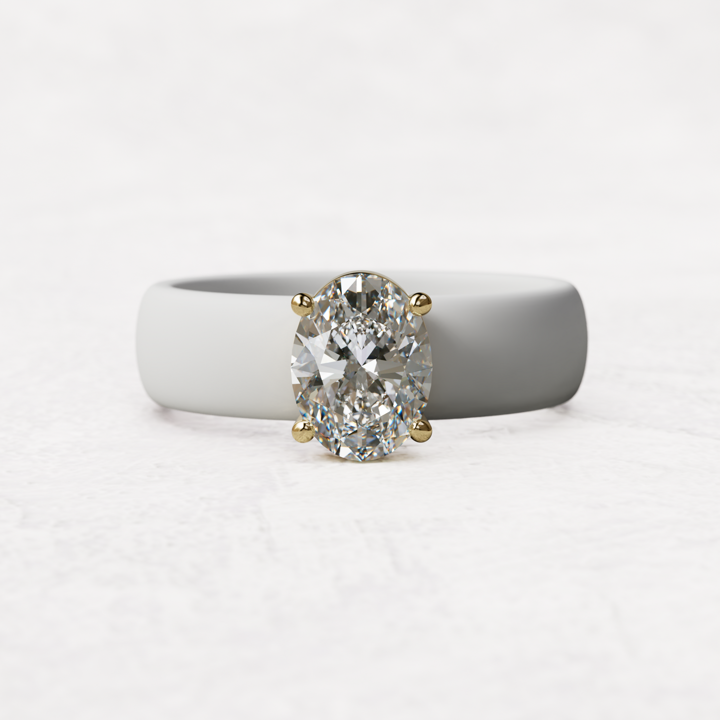 One carat oval diamond with white silicone band in 14 karat white gold