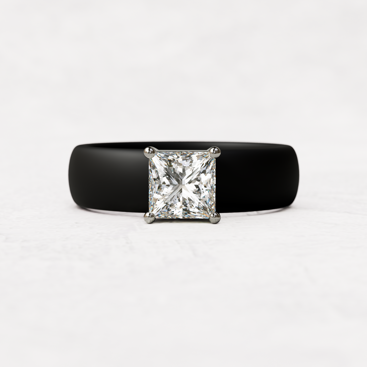 Black silicone ring with a one carat princess cut diamond set in 14 karat white Gold