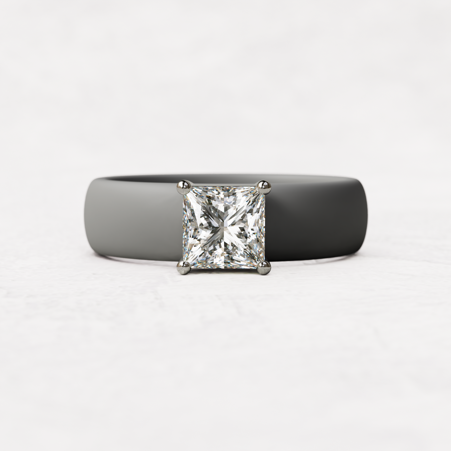 Gray silicone ring with a one carat princess cut diamond set in 14 karat white Gold