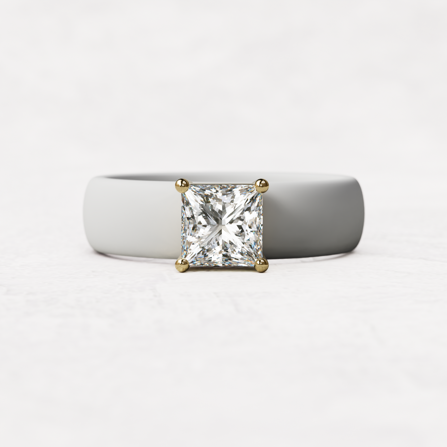 White silicone ring with a one carat princess cut diamond set in 14 karat Gold