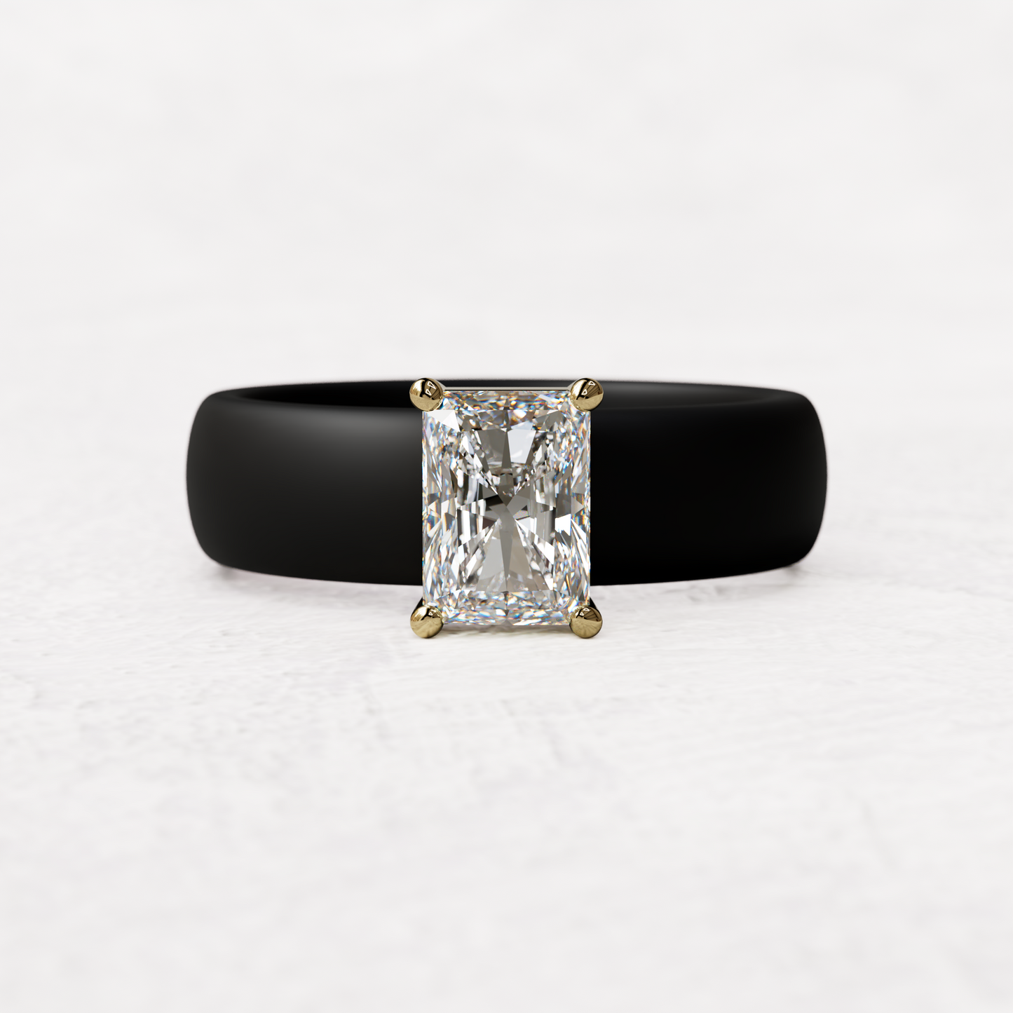 Black silicone band with a one carat radiant diamond set in 14 karat Gold