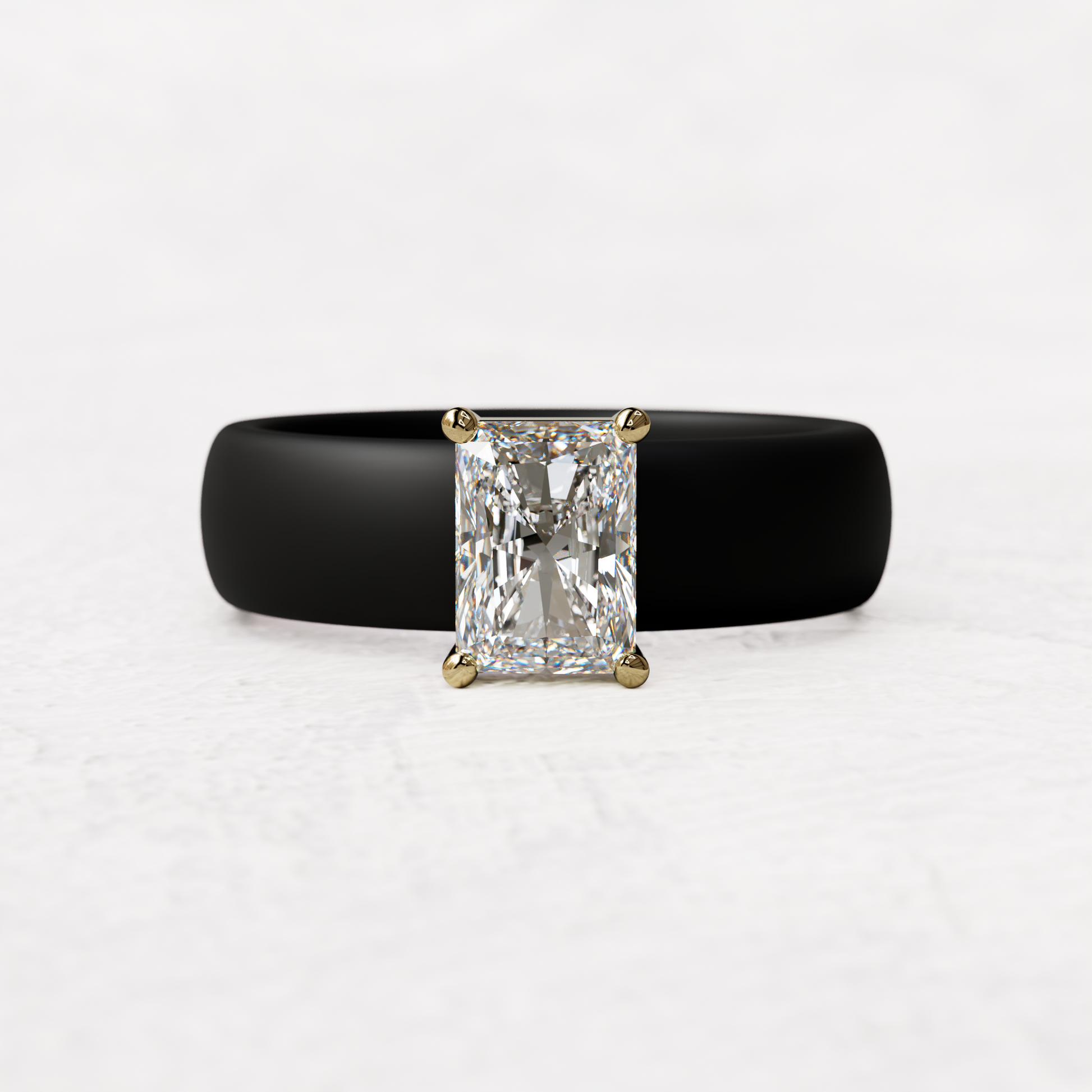 Black silicone band with a one carat radiant diamond set in 14 karat Gold