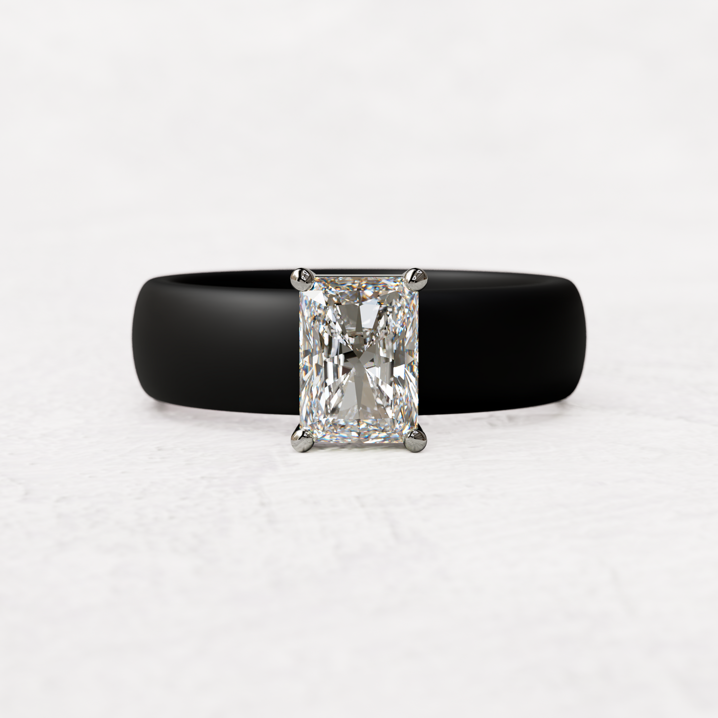 Black silicone band with a one carat radiant diamond set in 14 karat white Gold