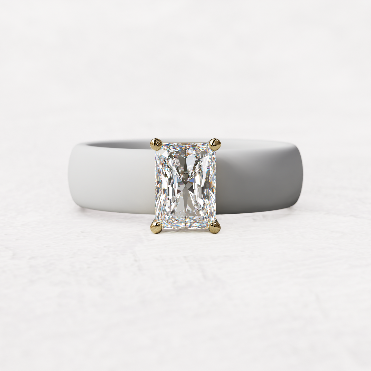 White silicone band with a one carat radiant diamond set in 14 karat Gold
