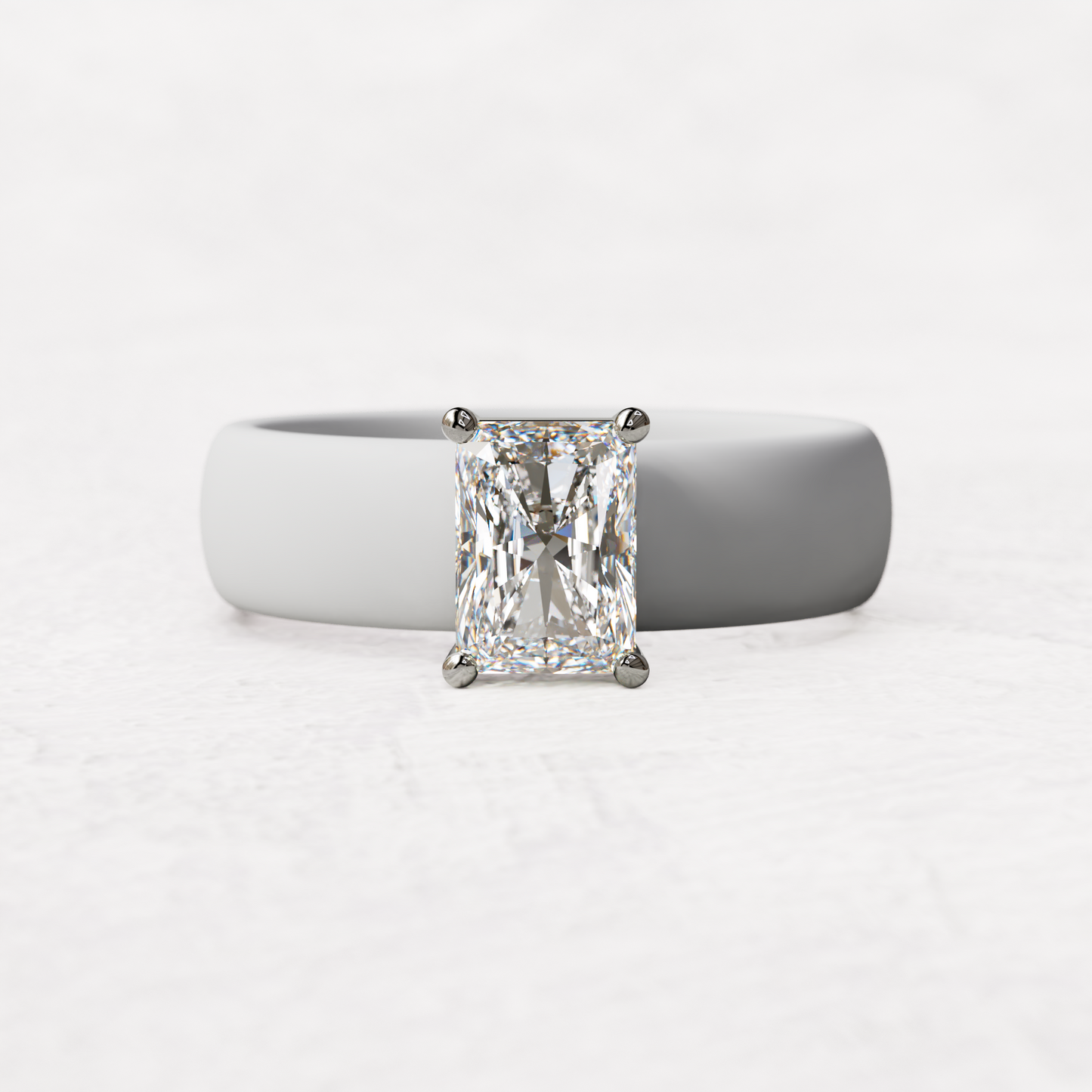 White silicone band with a one carat radiant diamond set in 14 karat white Gold