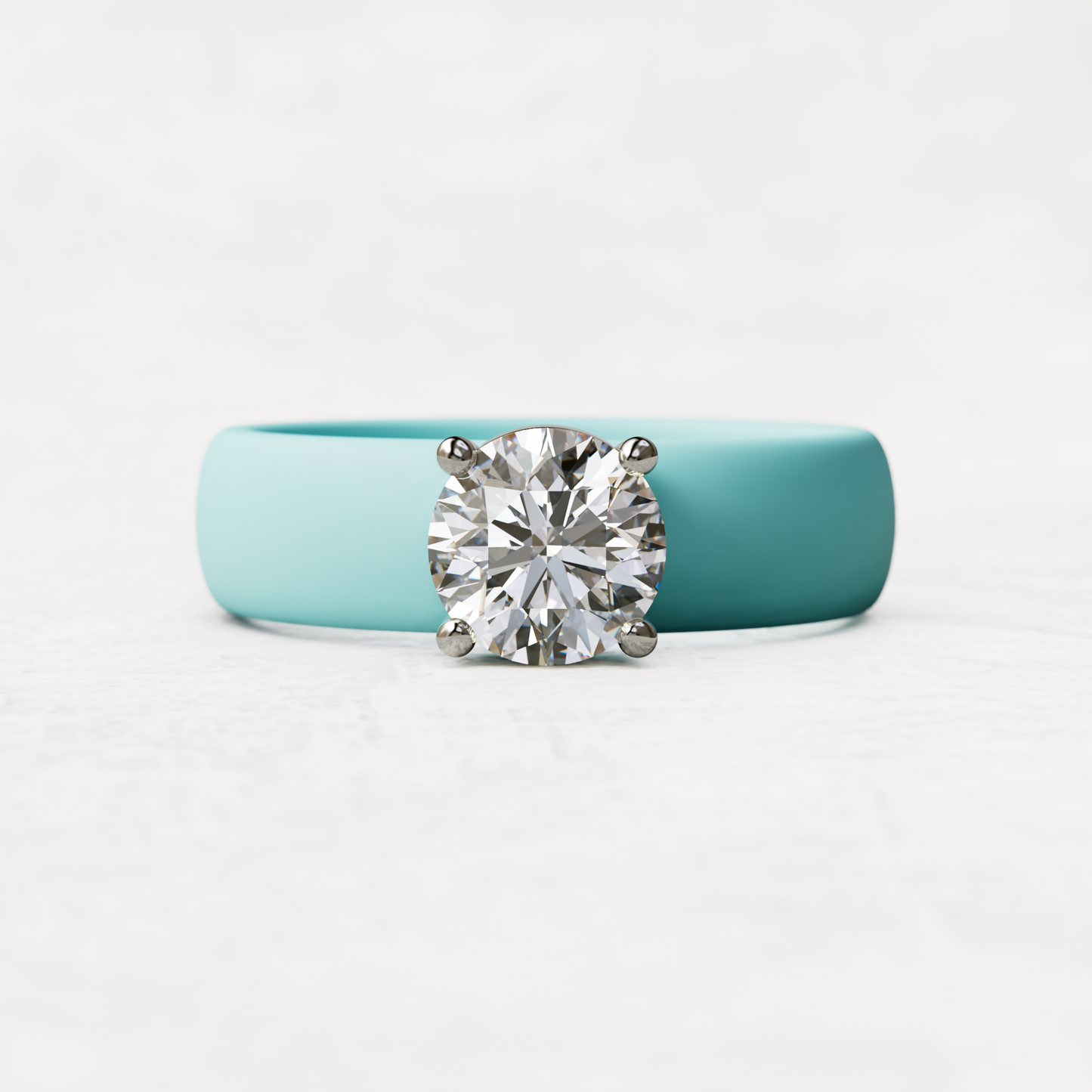 One carat round diamond with aqua silicone band in 14 karat white gold