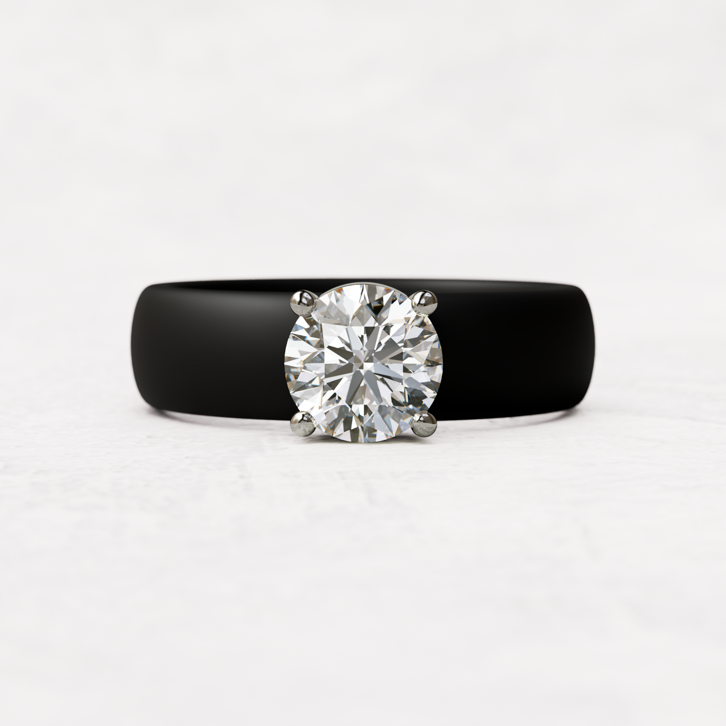 One carat round diamond with black silicone band in 14 karat white gold