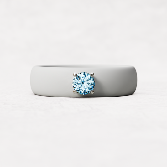 march birthstone white silicone band ring with a quarter carat aquamarine set in 925 sterling silver