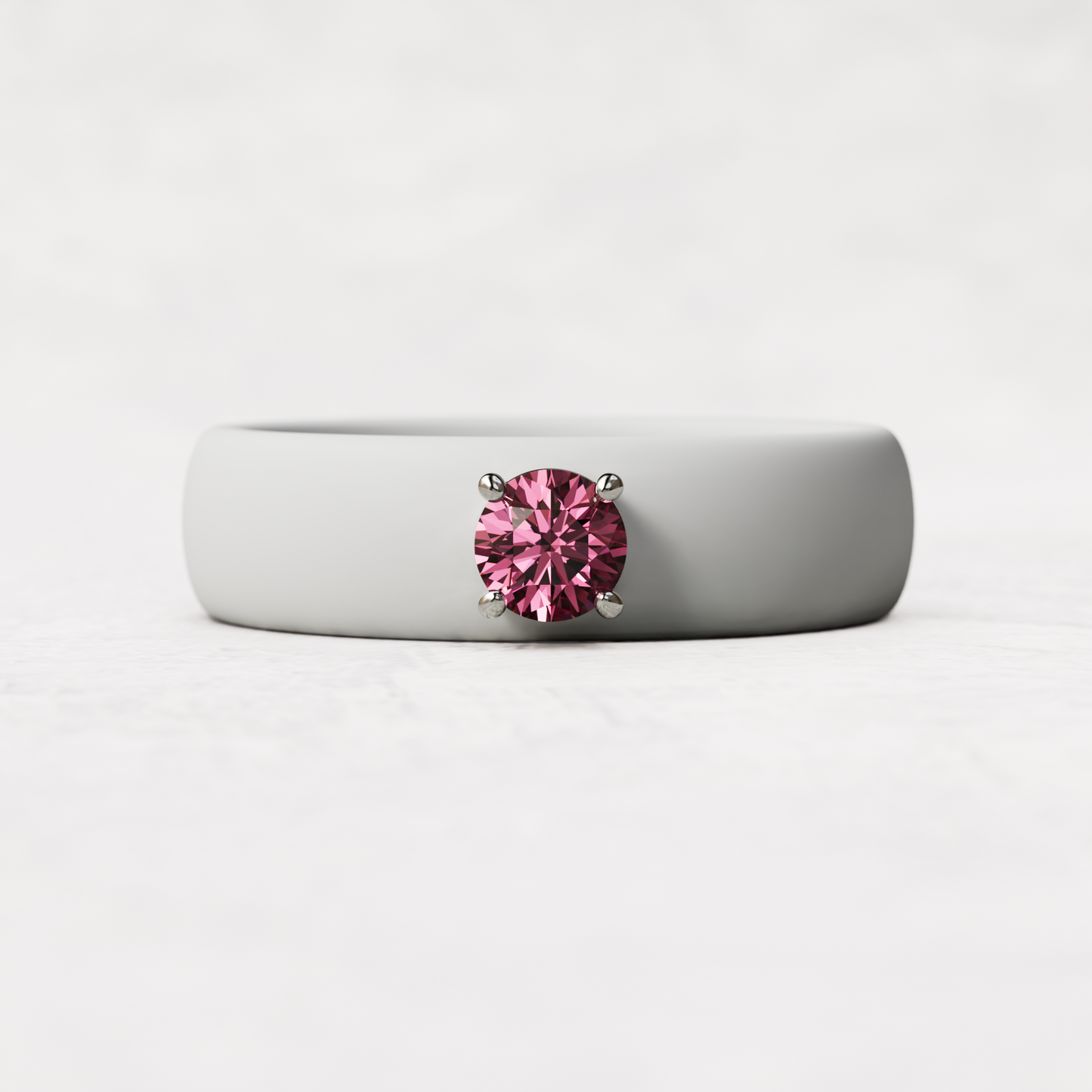 october birthstone white silicone band  ring with a quarter carat pink tourmaline set in 925 sterling silver