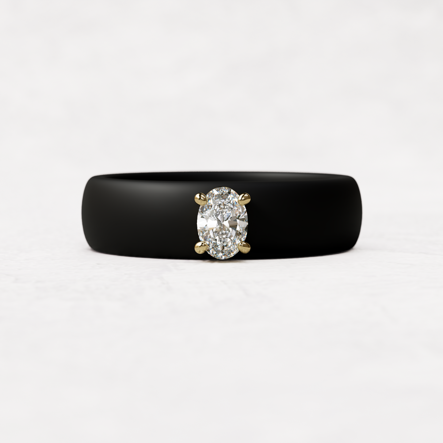 Black silicone ring with a quarter carat oval diamond set in 14 karat Gold