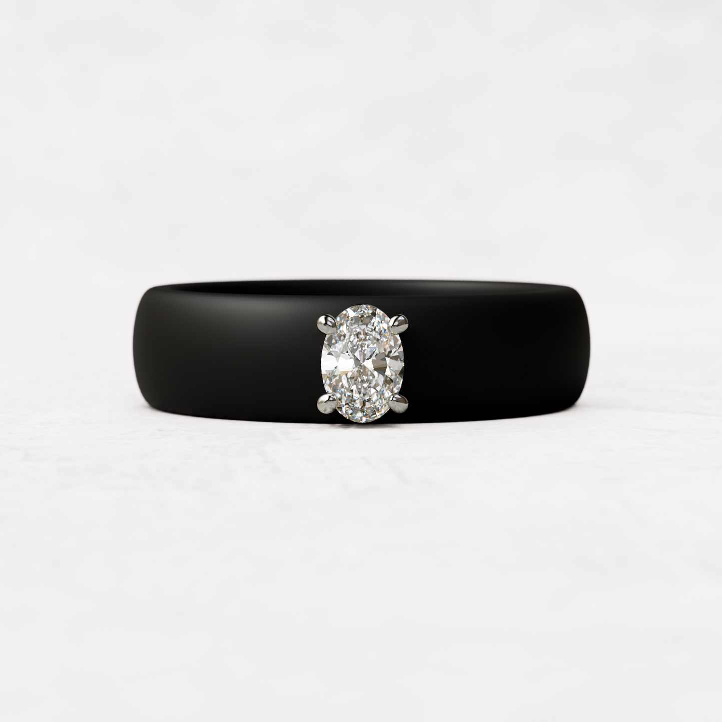 Balck silicone ring with a quarter carat oval diamond set in 14 karat white Gold