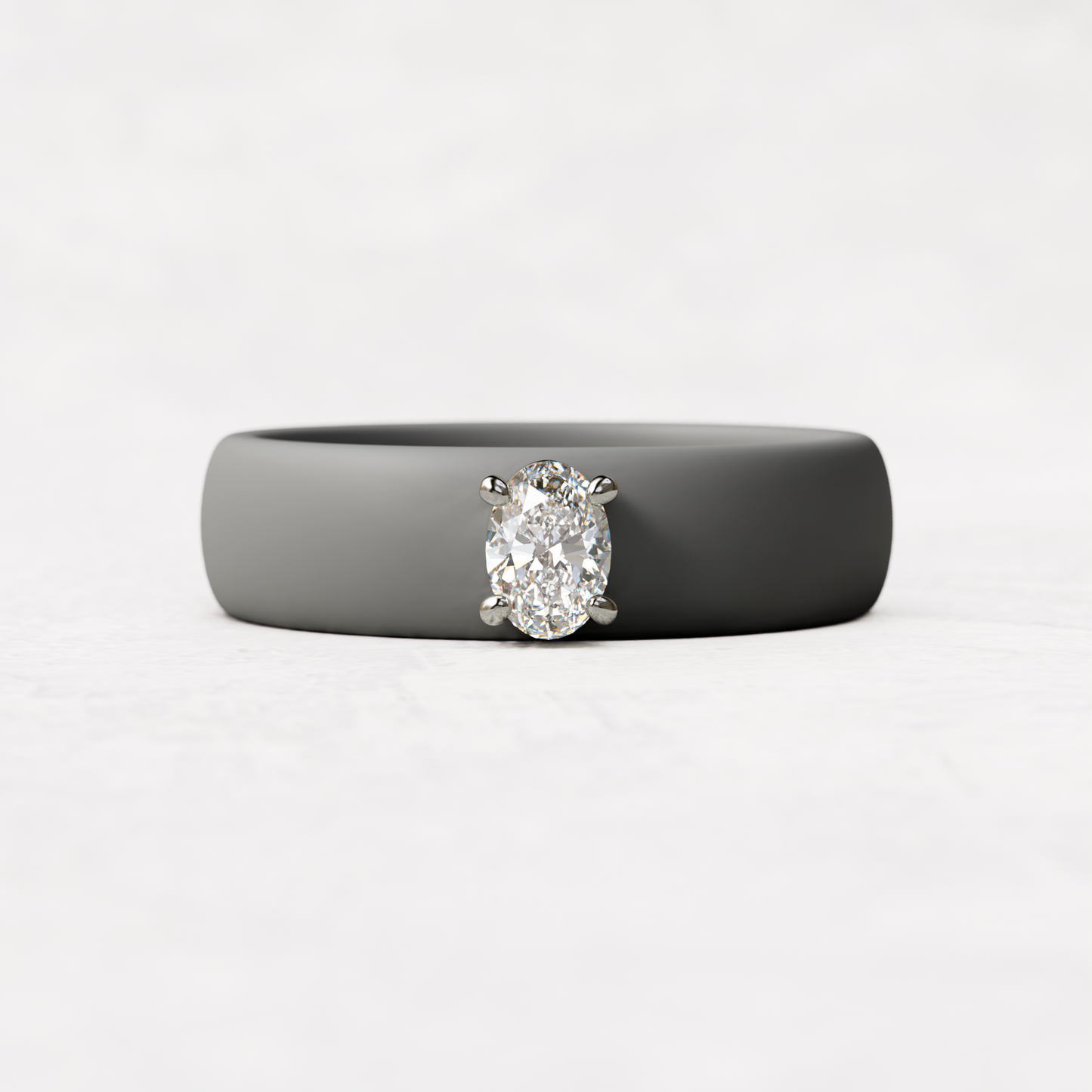 Gray silicone ring with a quarter carat oval diamond set in 14 karat white Gold