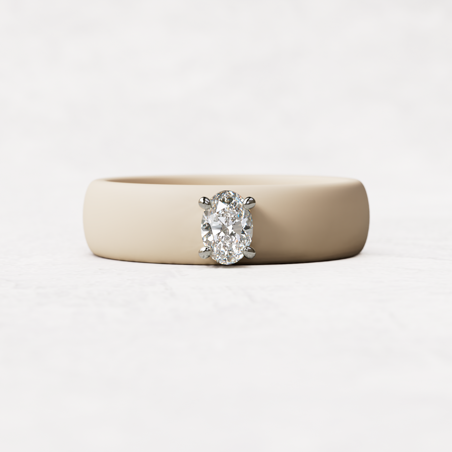 Nude silicone ring with a quarter carat oval diamond set in 14 karat white Gold