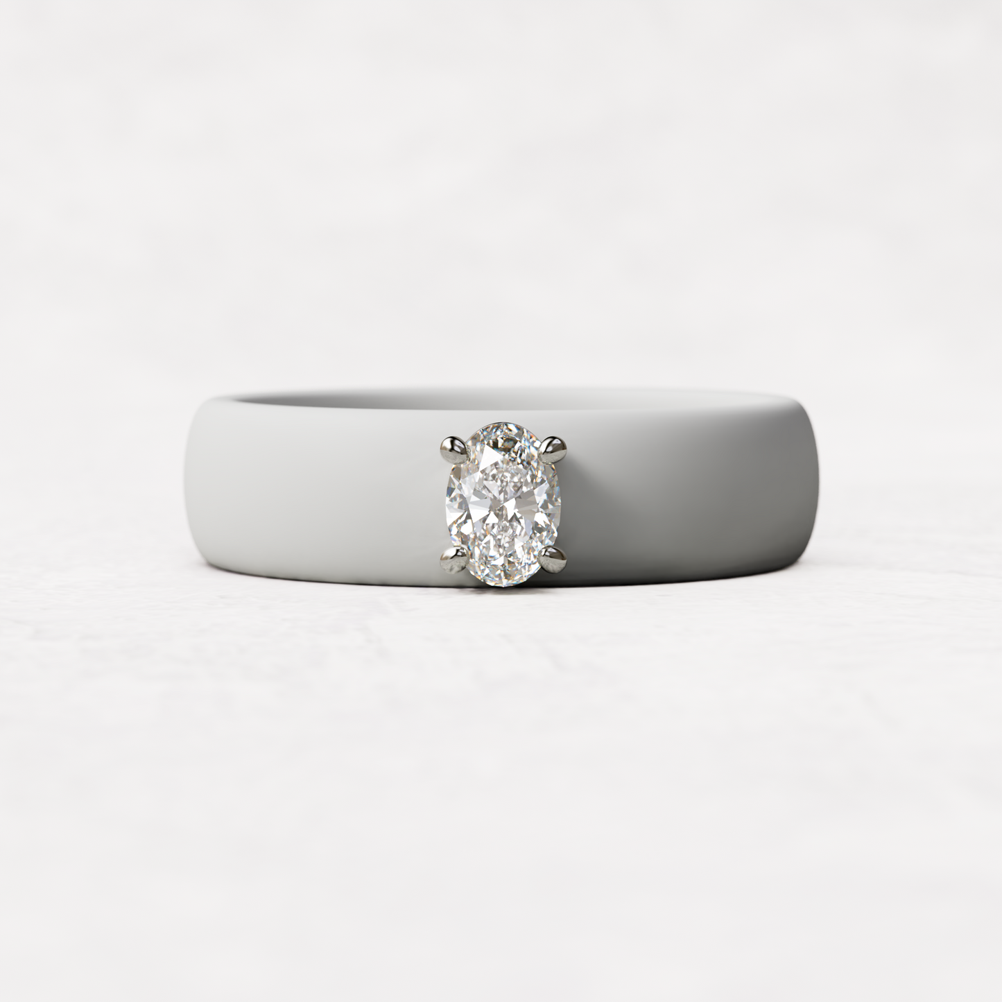 White silicone ring with a quarter carat oval diamond set in 14 karat white Gold