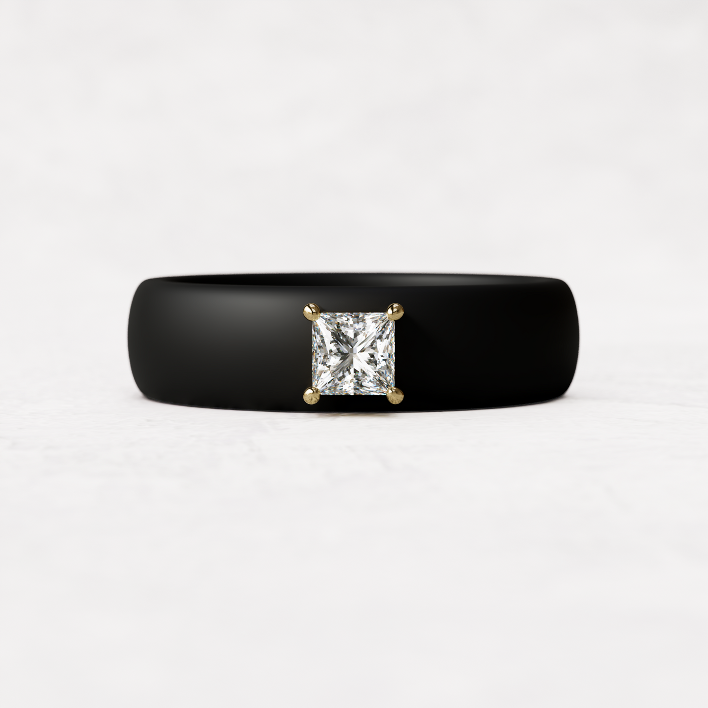 Black silicone ring with a quarter carat princess cut diamond set in 14 karat Gold
