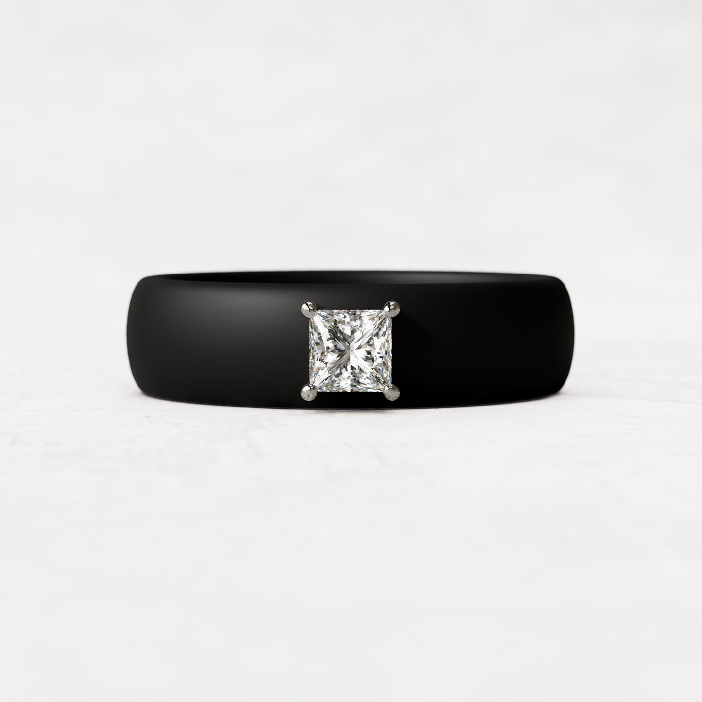 Black silicone ring with a quarter carat princess cut diamond set in 14 karat white Gold