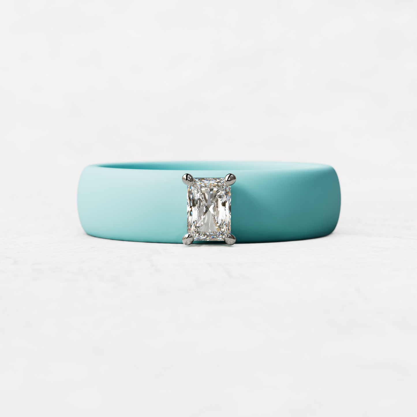 Aqua silicone band with a quarter carat radiant diamond set in 14 karat white Gold