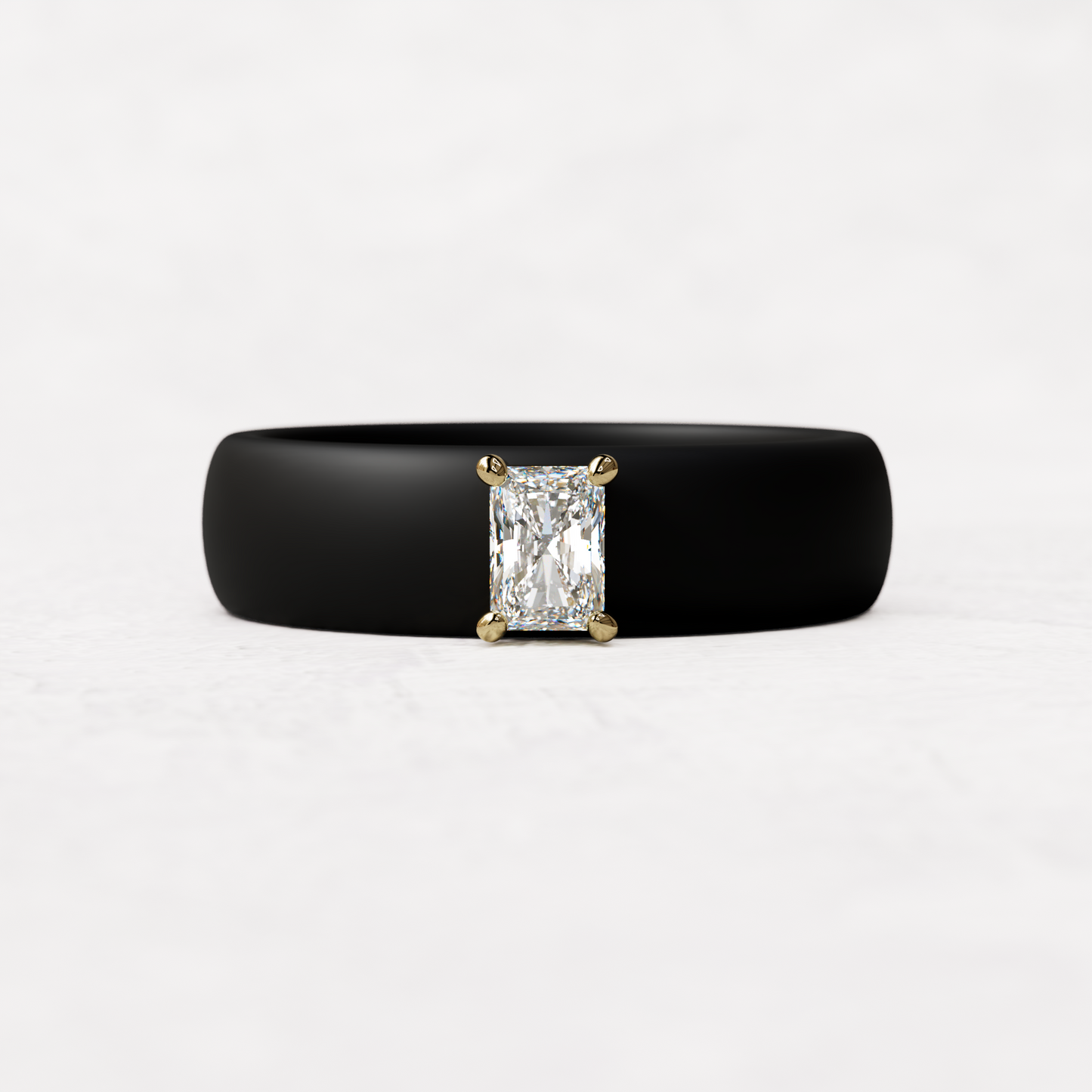 Black silicone band with a quarter carat radiant diamond set in 14 karat Gold