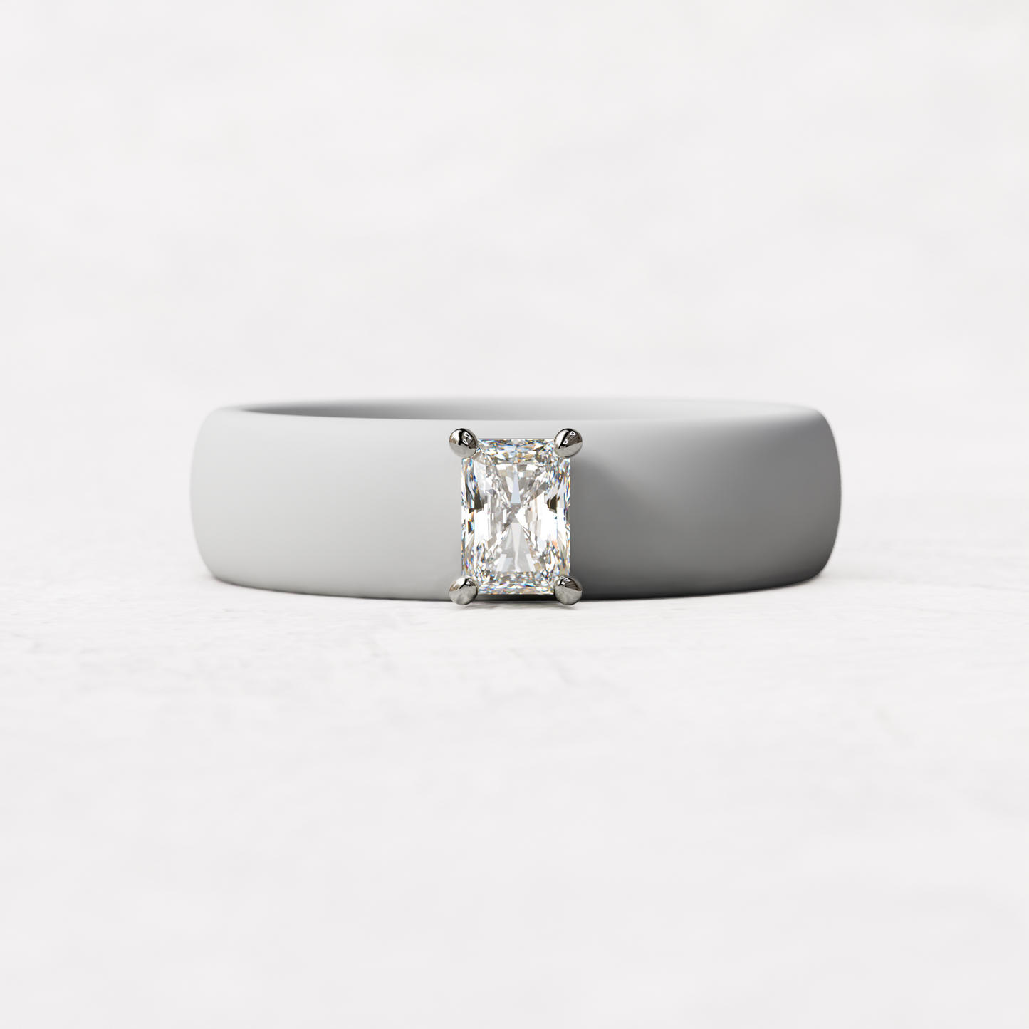 WHite silicone band with a quarter carat radiant diamond set in 14 karat white Gold