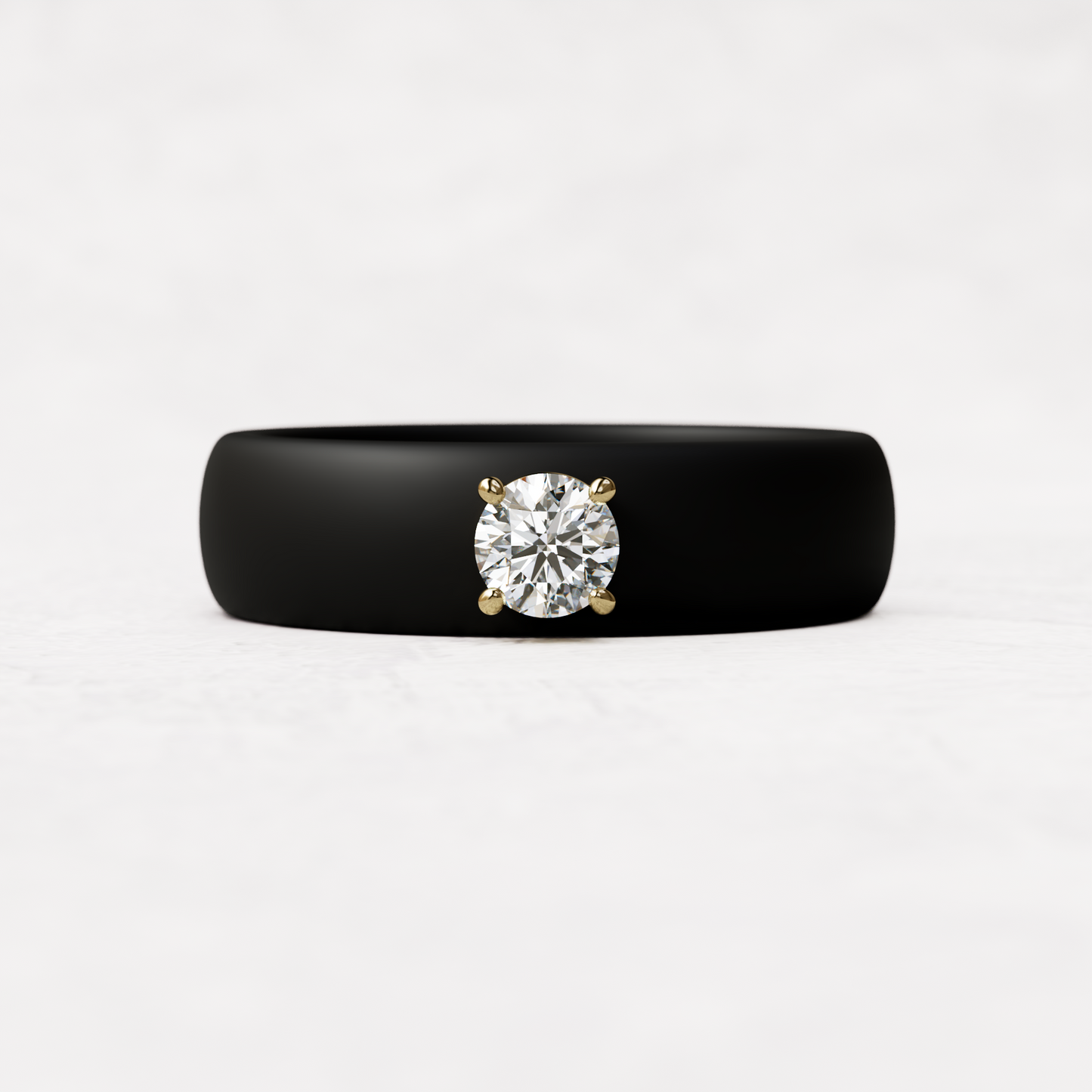 quarter carat round diamond with black silicone band in 14 karat gold