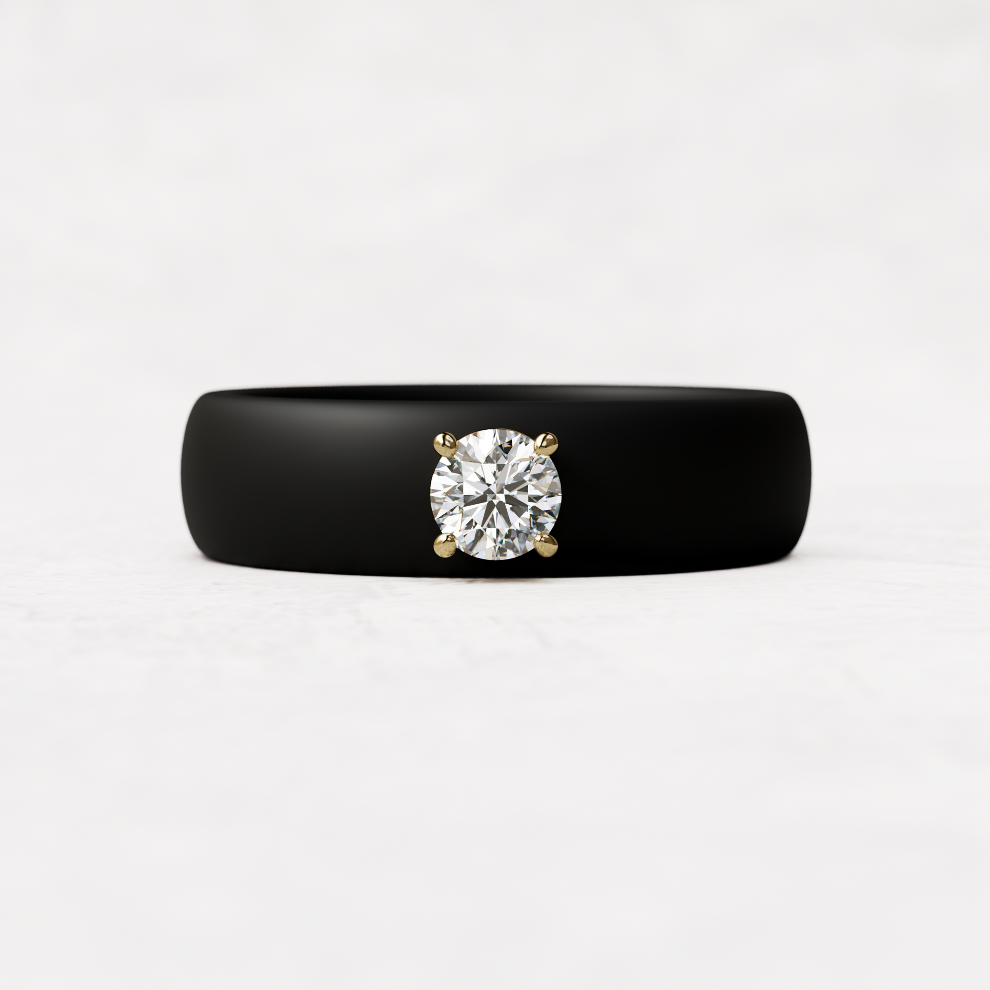 quarter carat round diamond with black silicone band in 14 karat gold