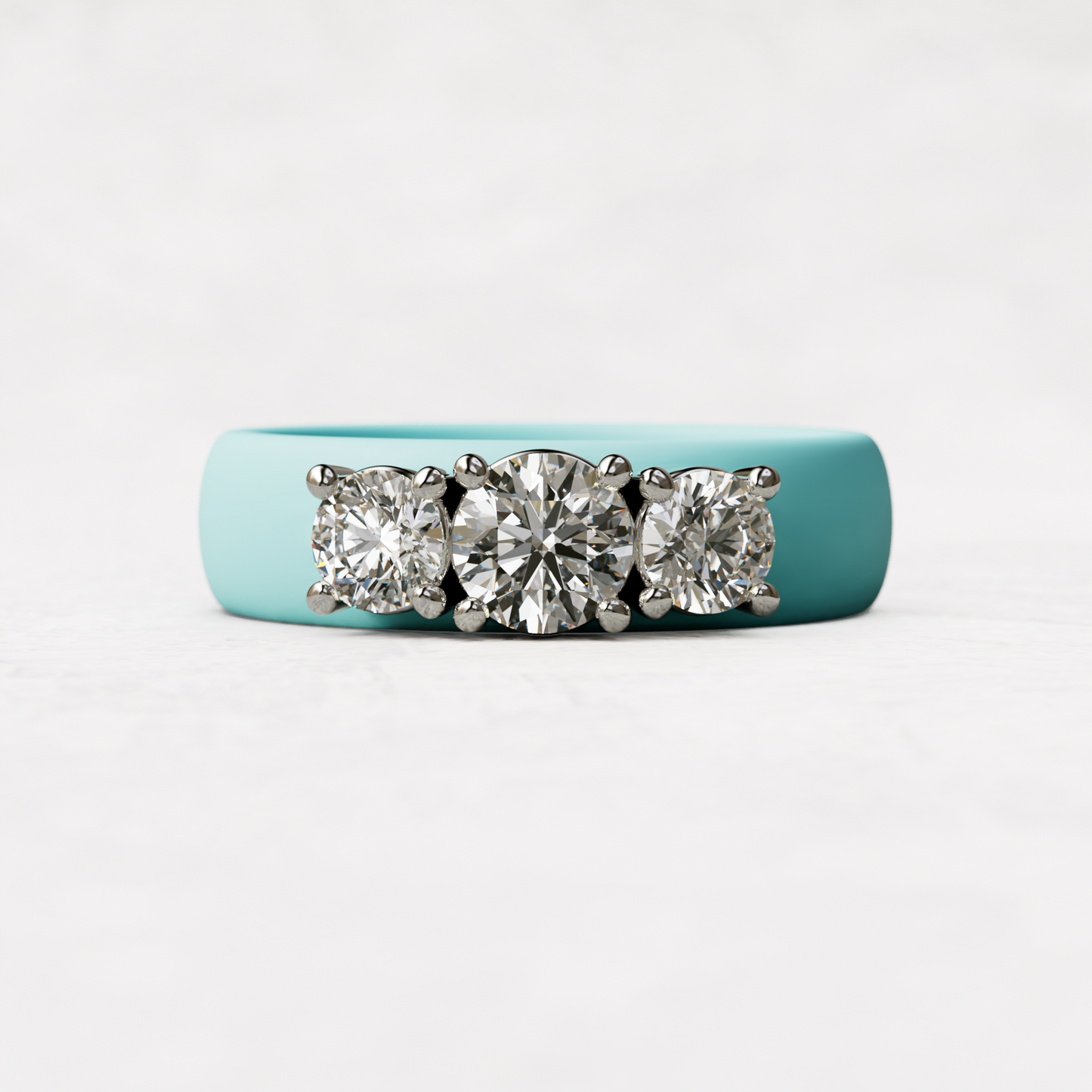 Three stone Aqua silicone diamond ring with one half carat round diamond and two quarter carat round diamonds set in 14 karat white gold