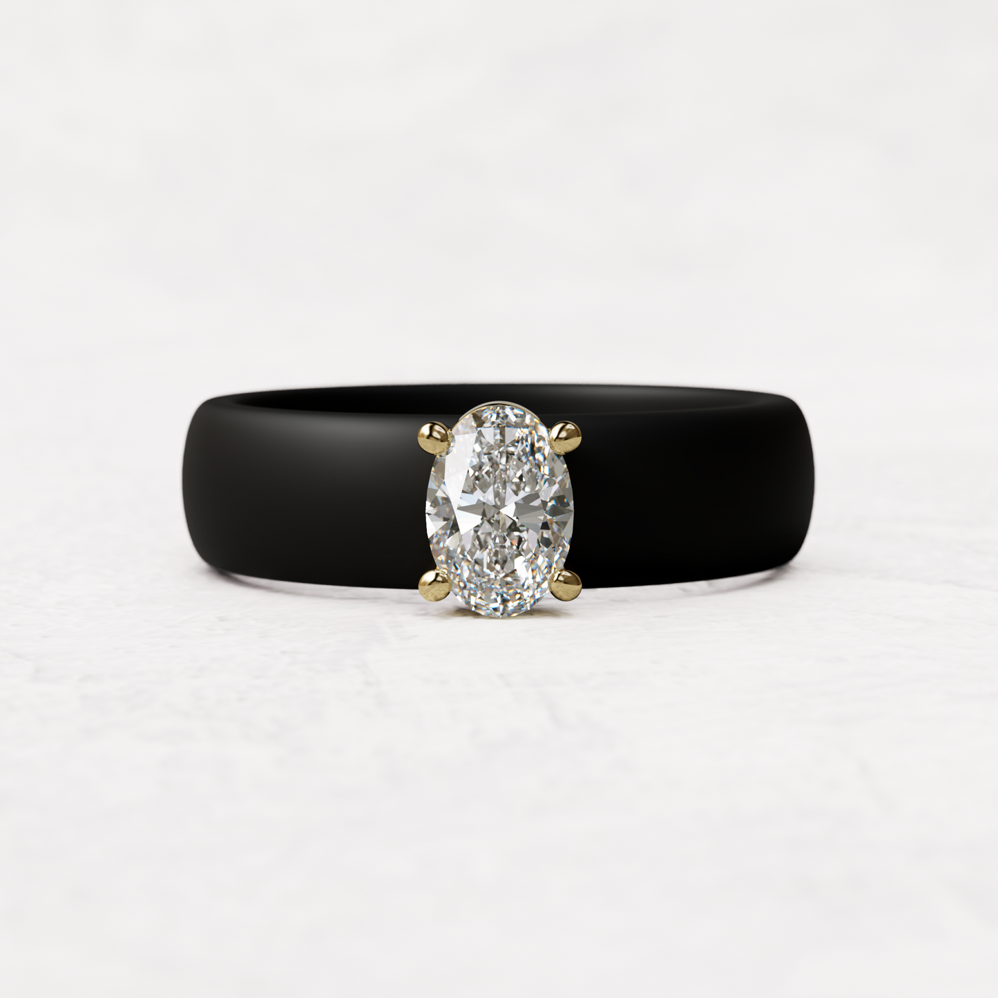 Black silicone ring with a half carat oval diamond set in 14 karat Gold