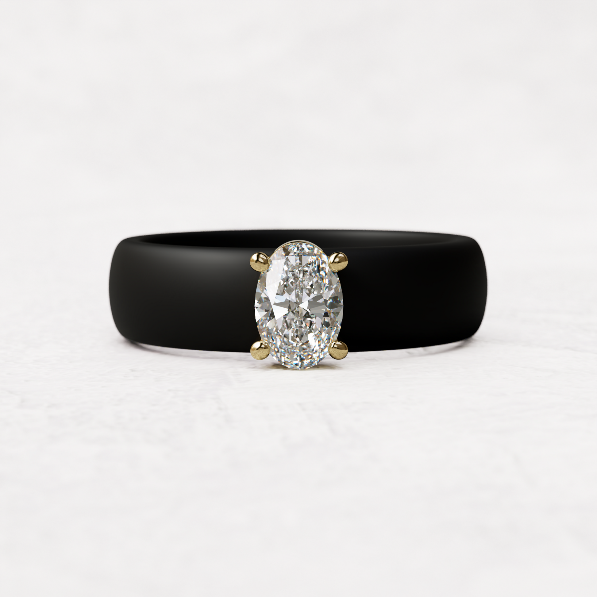 Black silicone ring with a half carat oval diamond set in 14 karat Gold