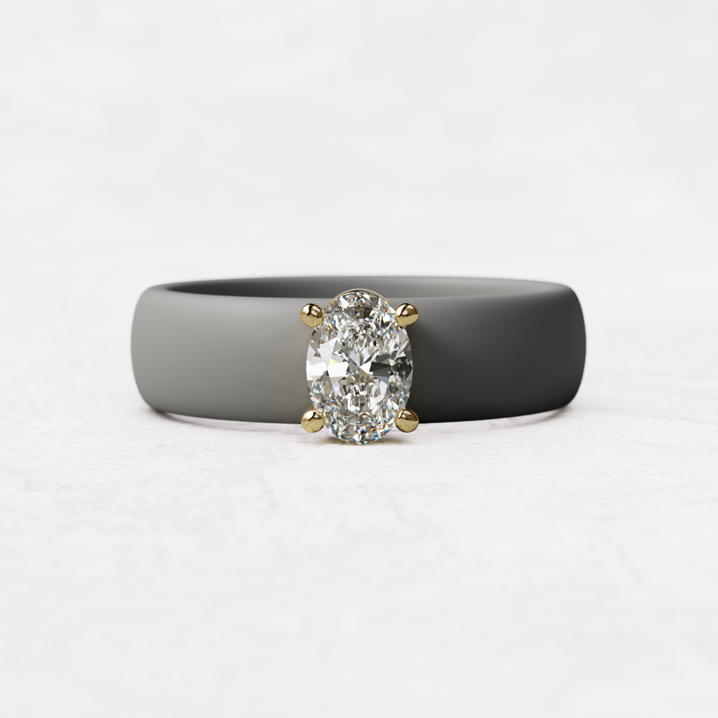Gray silicone ring with a half carat oval diamond set in 14 karat Gold