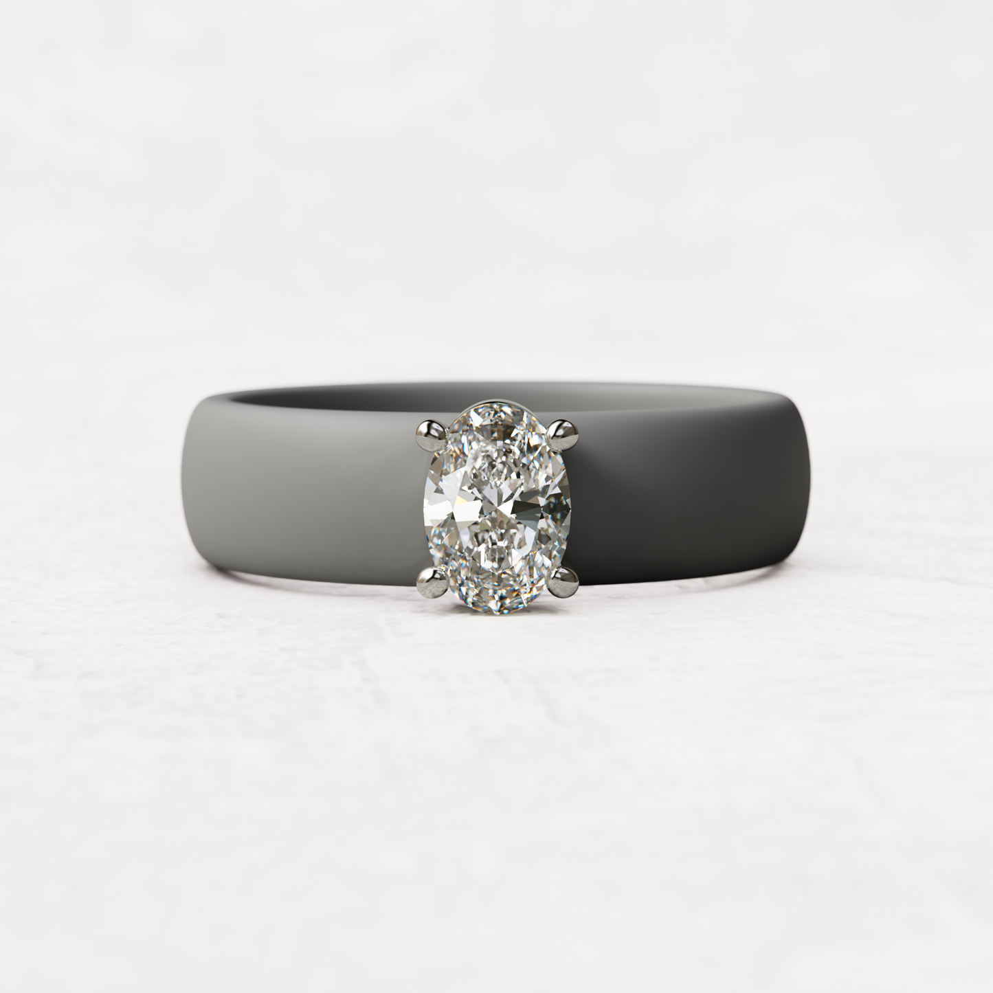 Gray silicone ring with a half carat oval diamond set in 14 karat white Gold