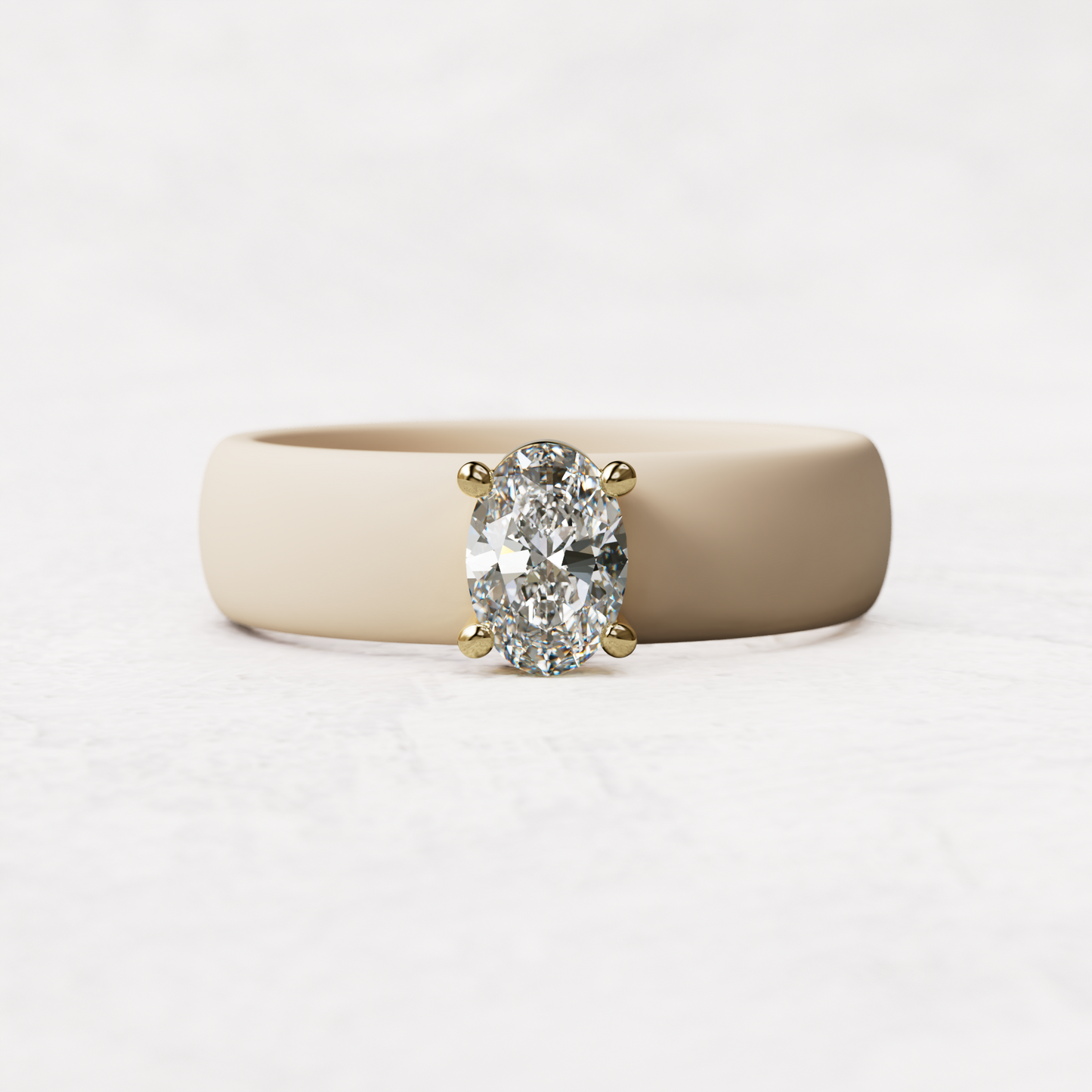 Nudesilicone ring with a half carat oval diamond set in 14 karat Gold