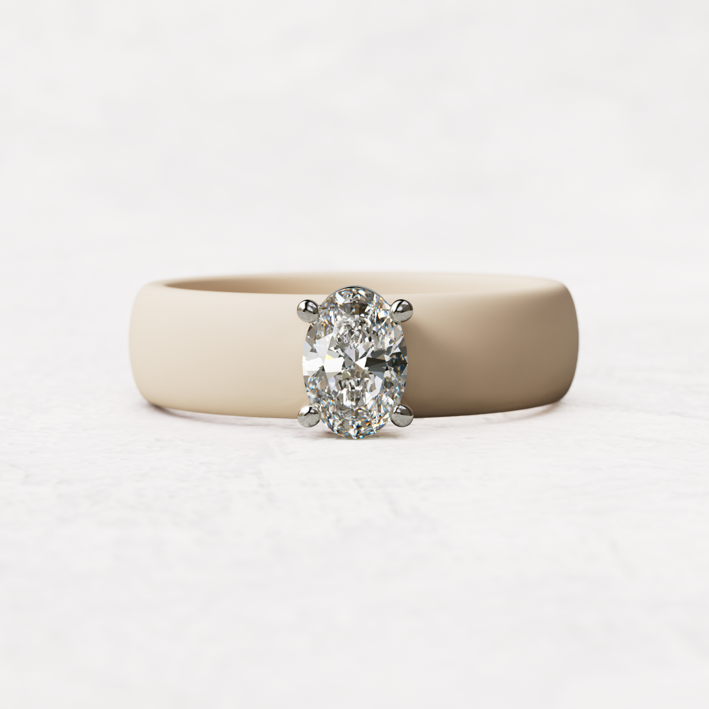 Nude silicone ring with a half carat oval diamond set in 14 karat white Gold