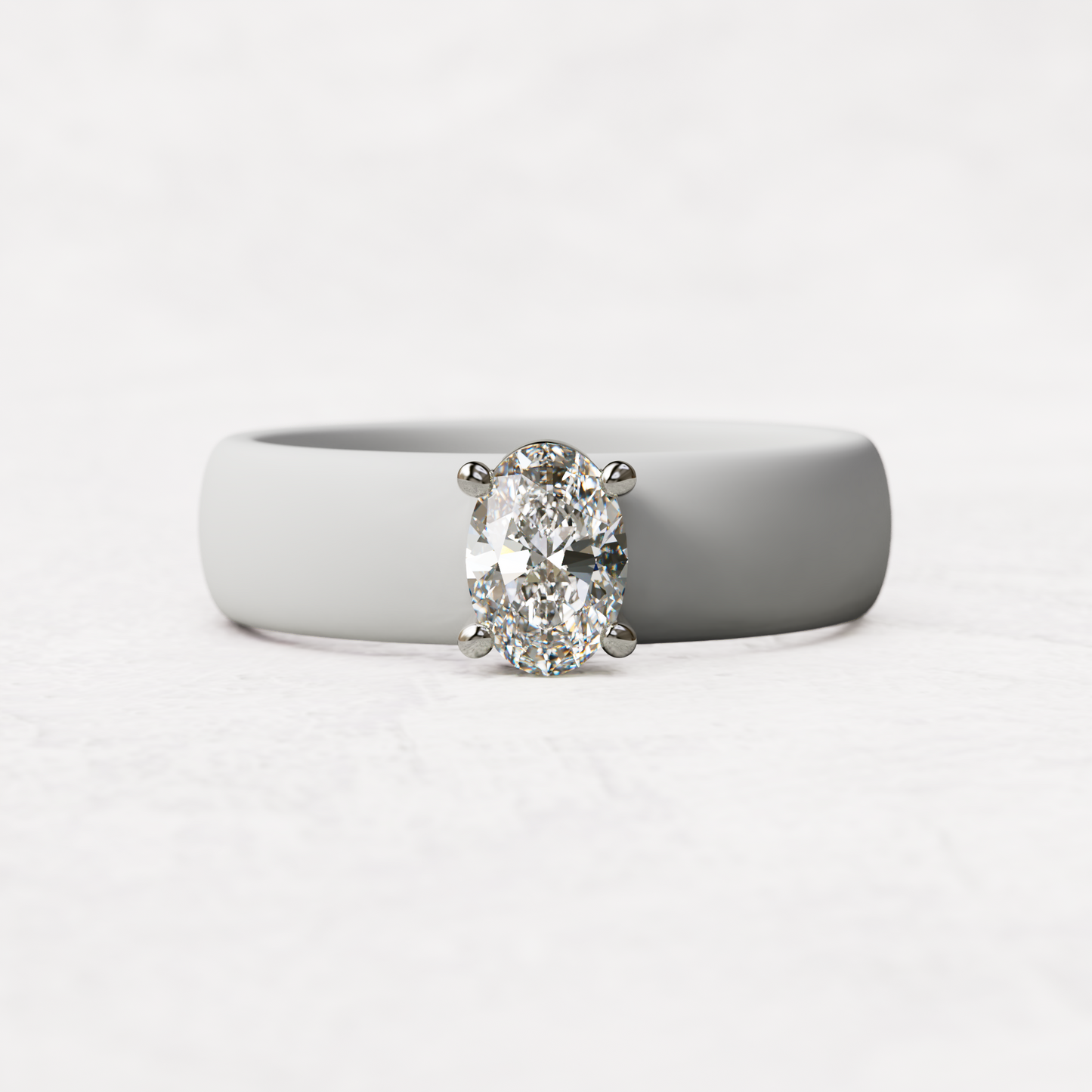 White silicone ring with a half carat oval diamond set in 14 karat white Gold