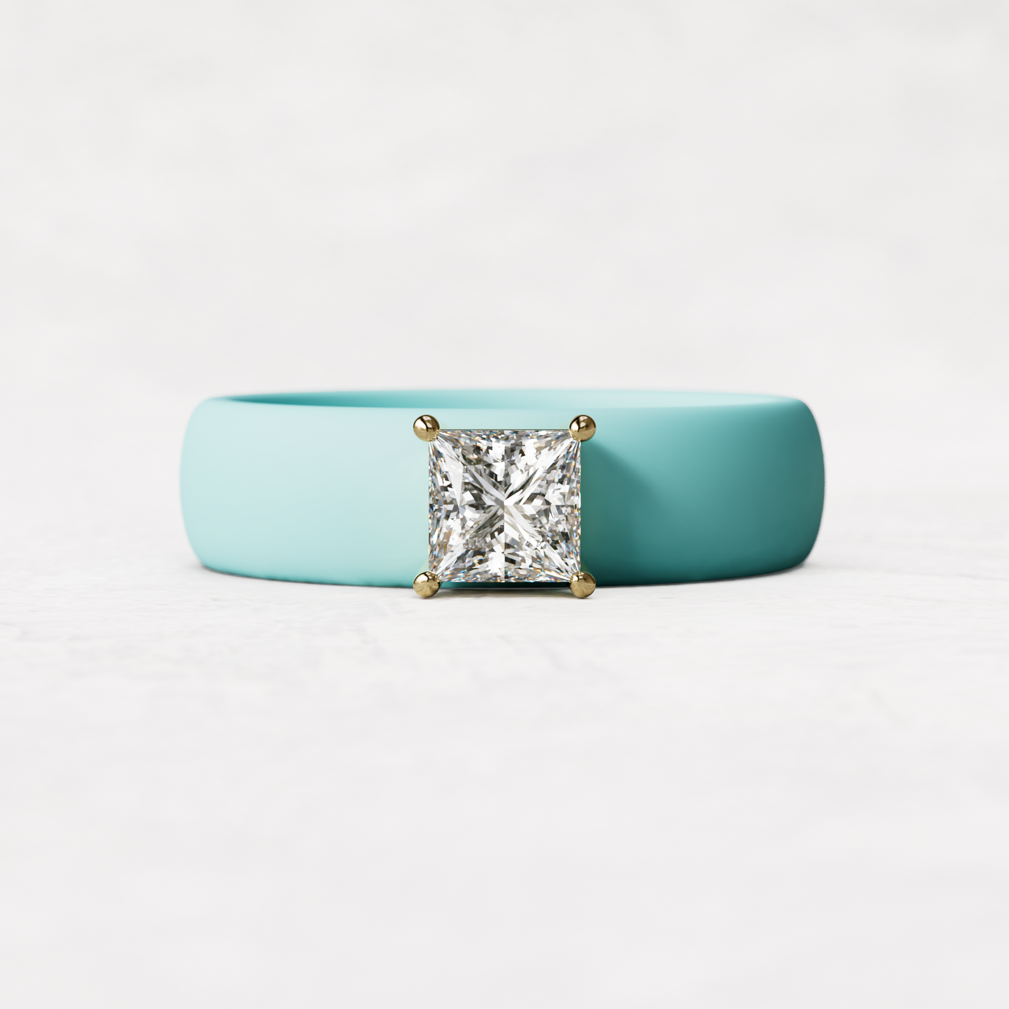 Aqua silicone ring with a half carat princess cut diamond set in 14 karat Gold