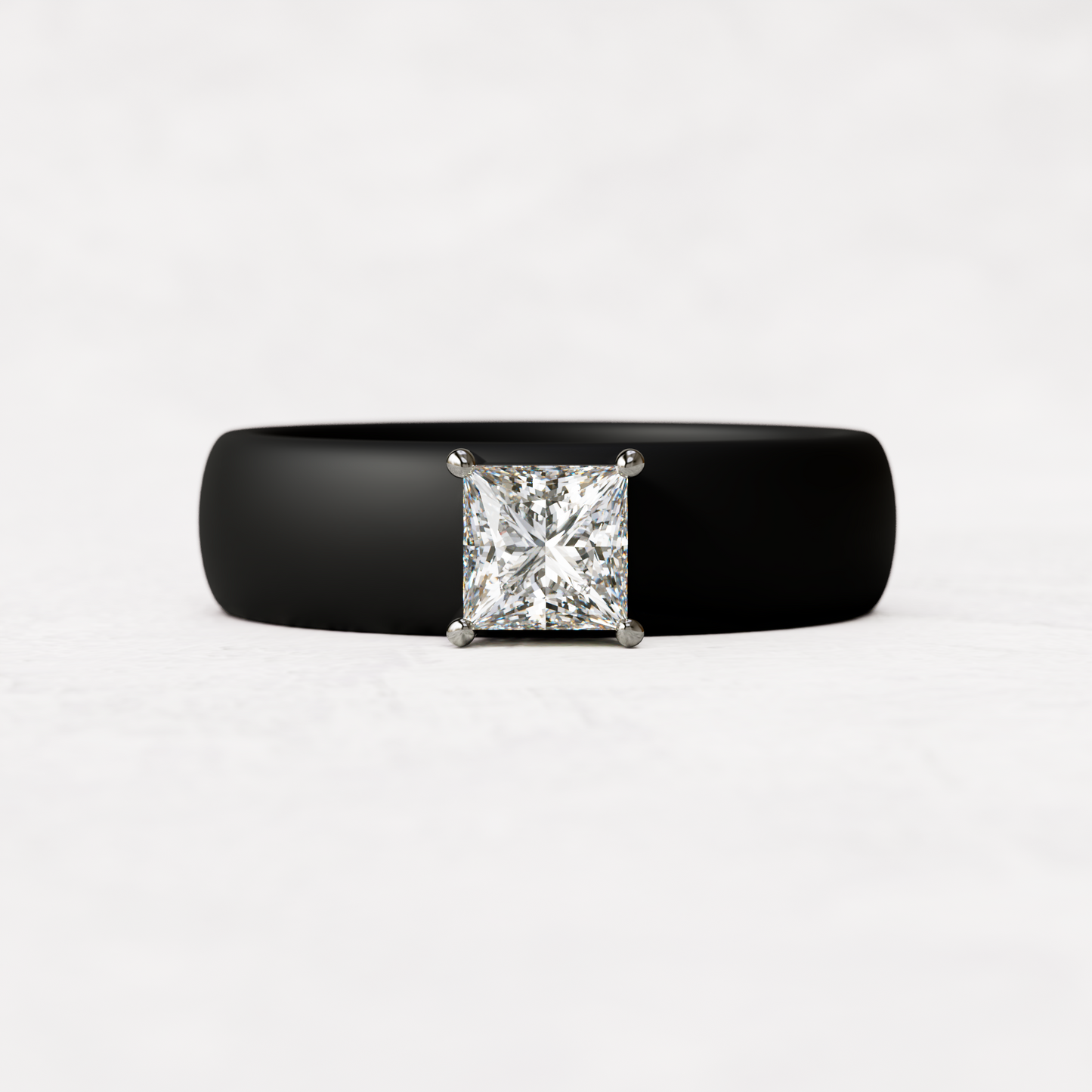 Black silicone ring with a half carat princess cut diamond set in 14 karat white Gold