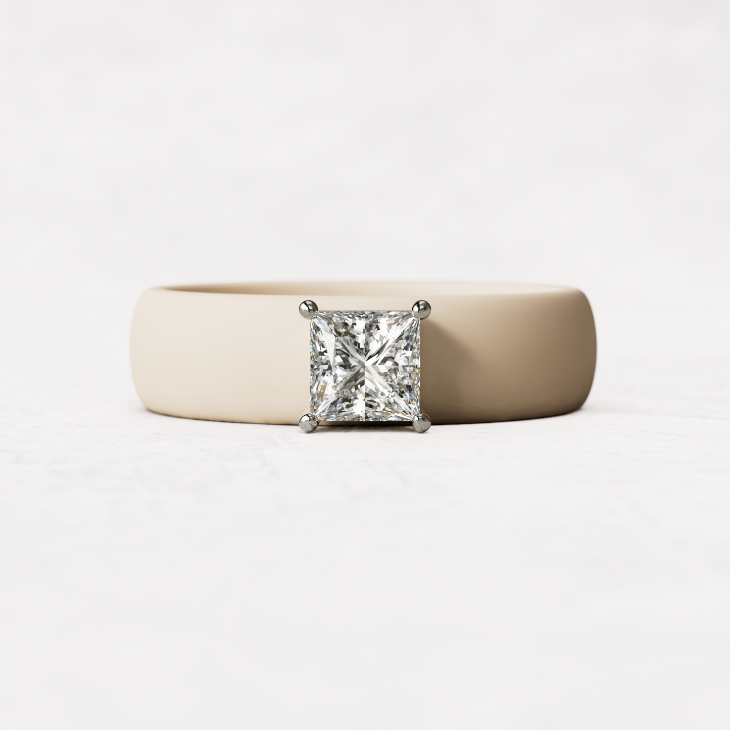 Nude silicone ring with a half carat princess cut diamond set in 14 karat white Gold