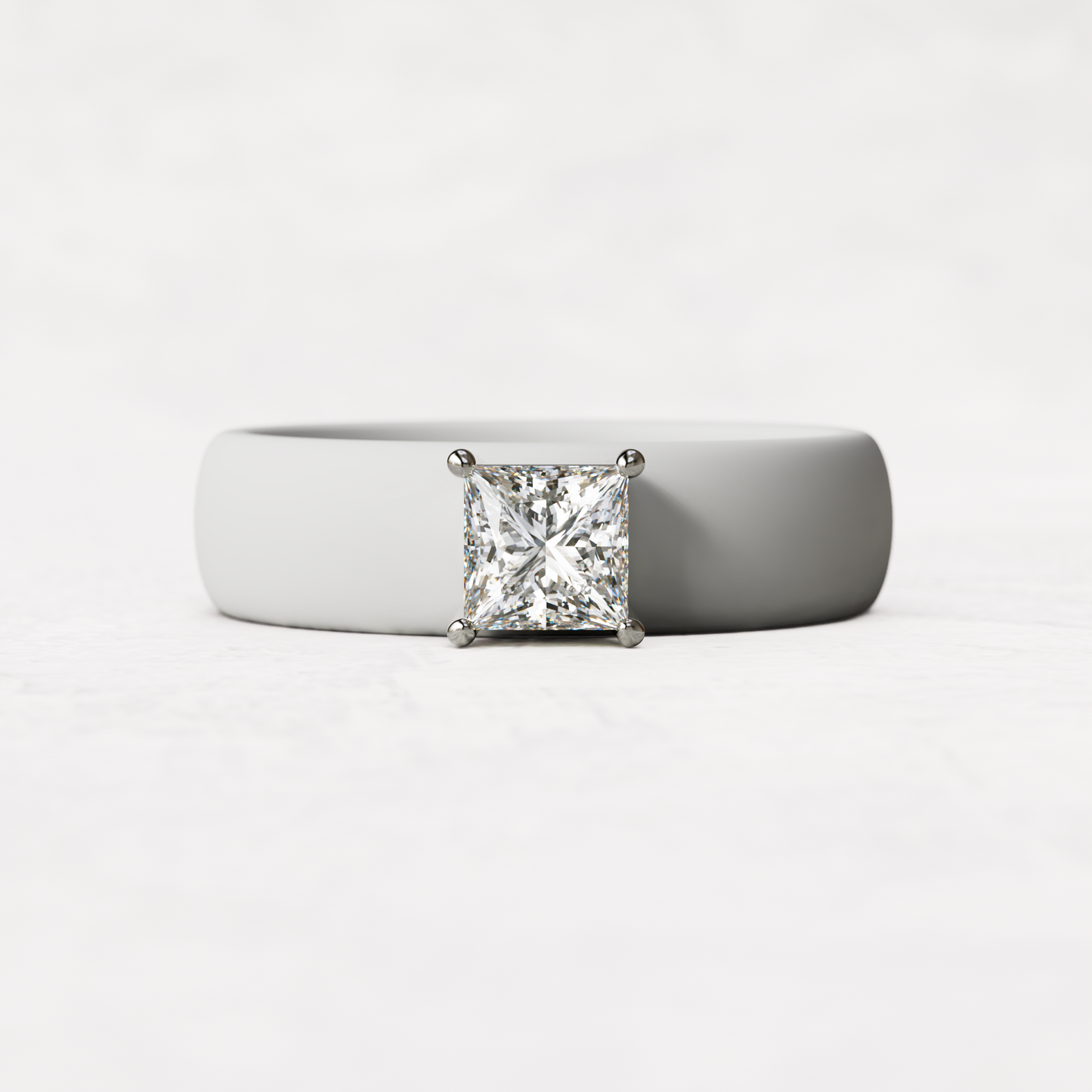 WHite silicone ring with a half carat princess cut diamond set in 14 karat white Gold