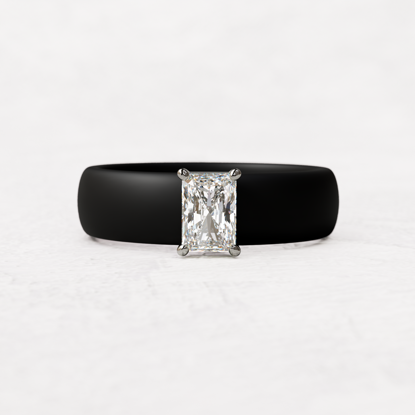 Black silicone band with a half carat radiant diamond set in 14 karat white Gold