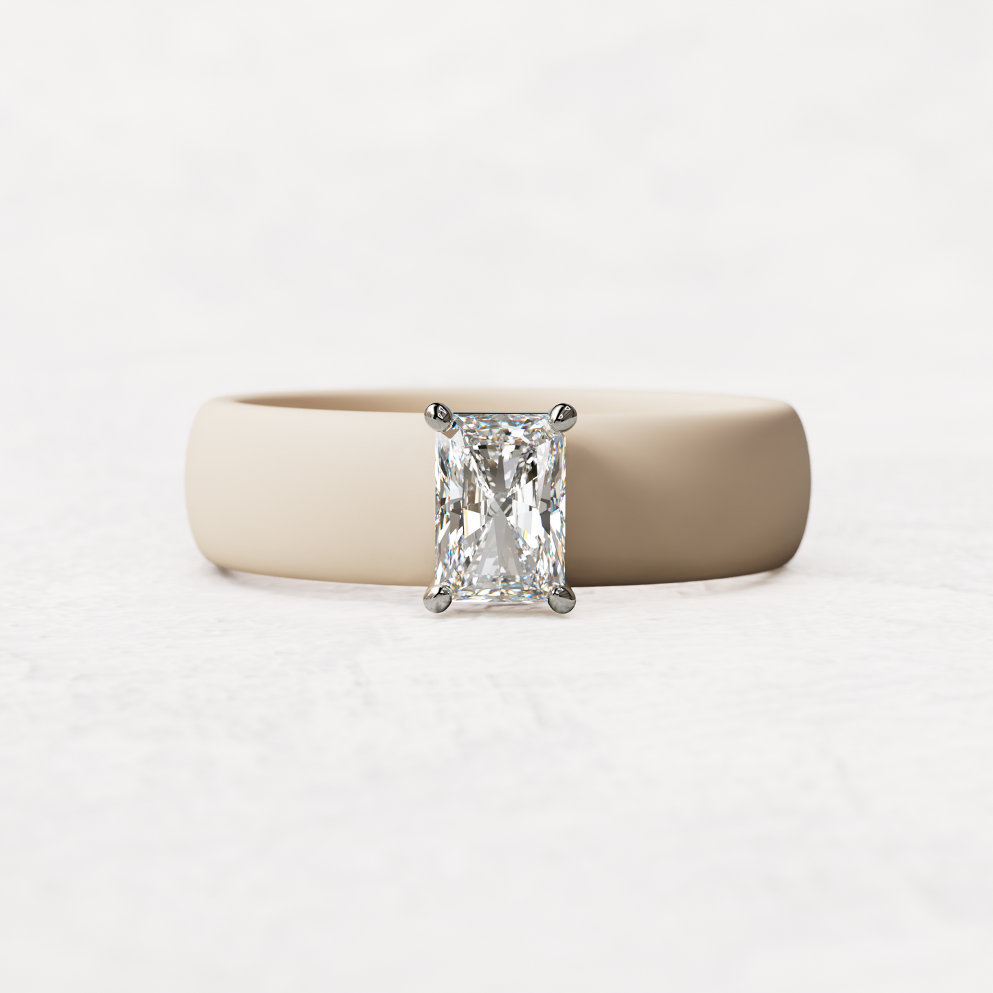Nude silicone band with a half carat radiant diamond set in 14 karat white Gold