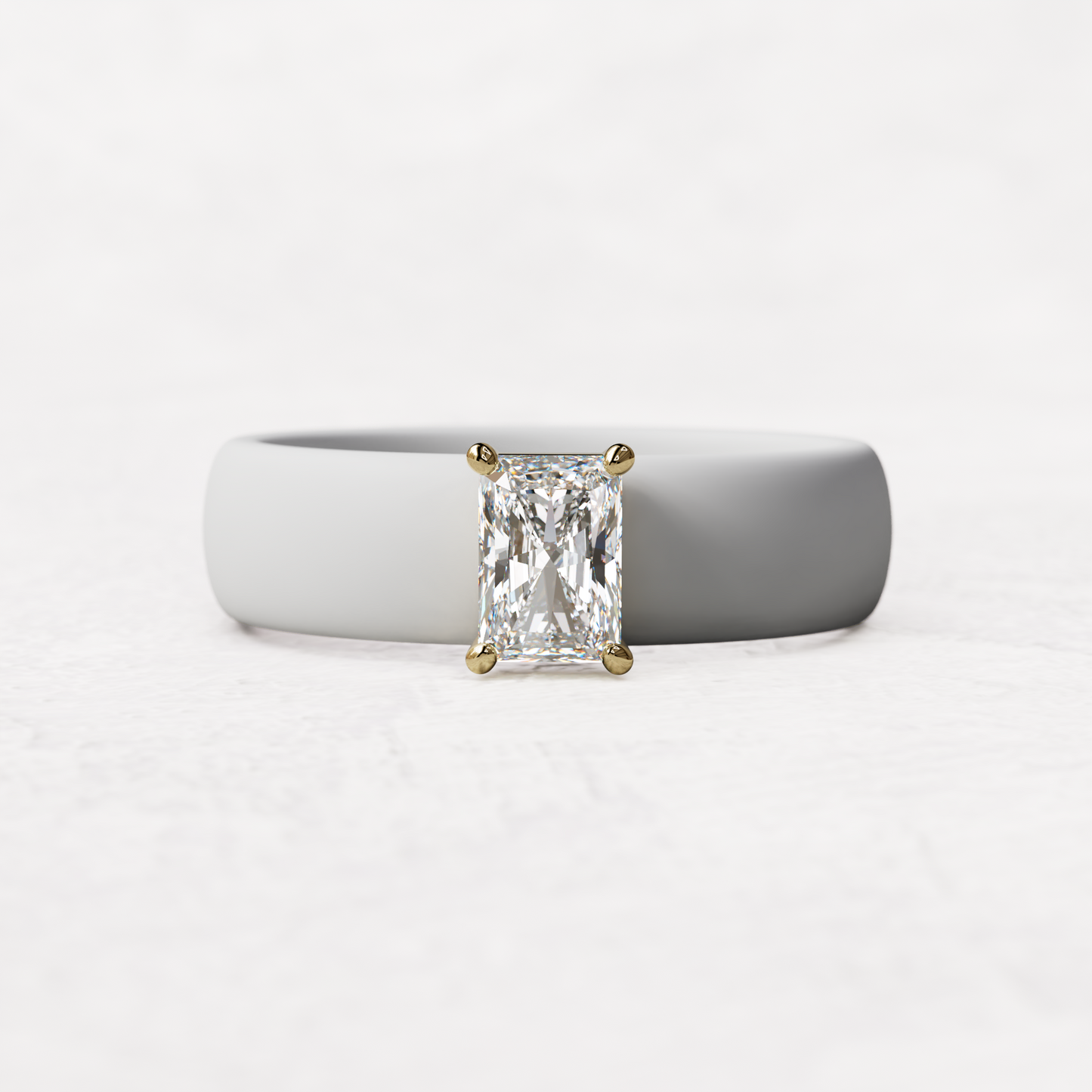 White silicone band with a half carat radiant diamond set in 14 karat Gold