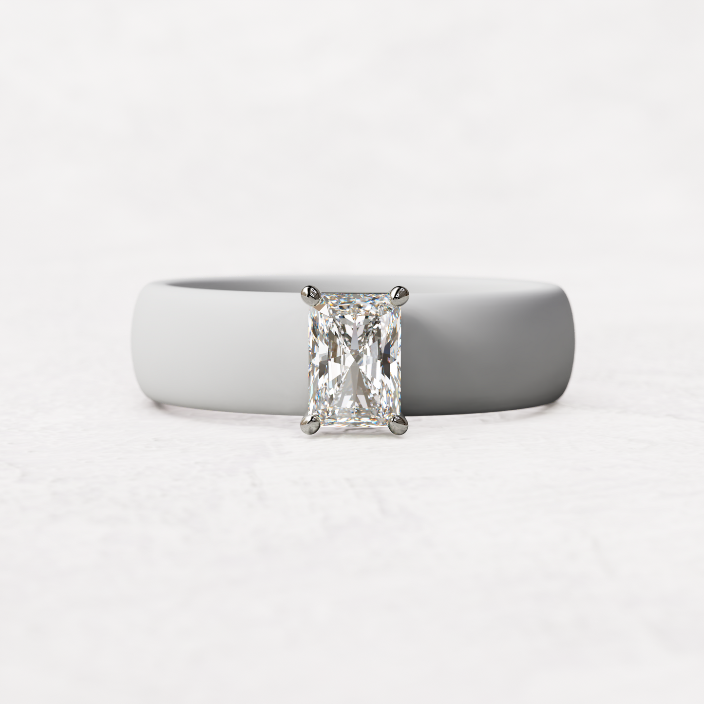 White silicone band with a half carat radiant diamond set in 14 karat white Gold