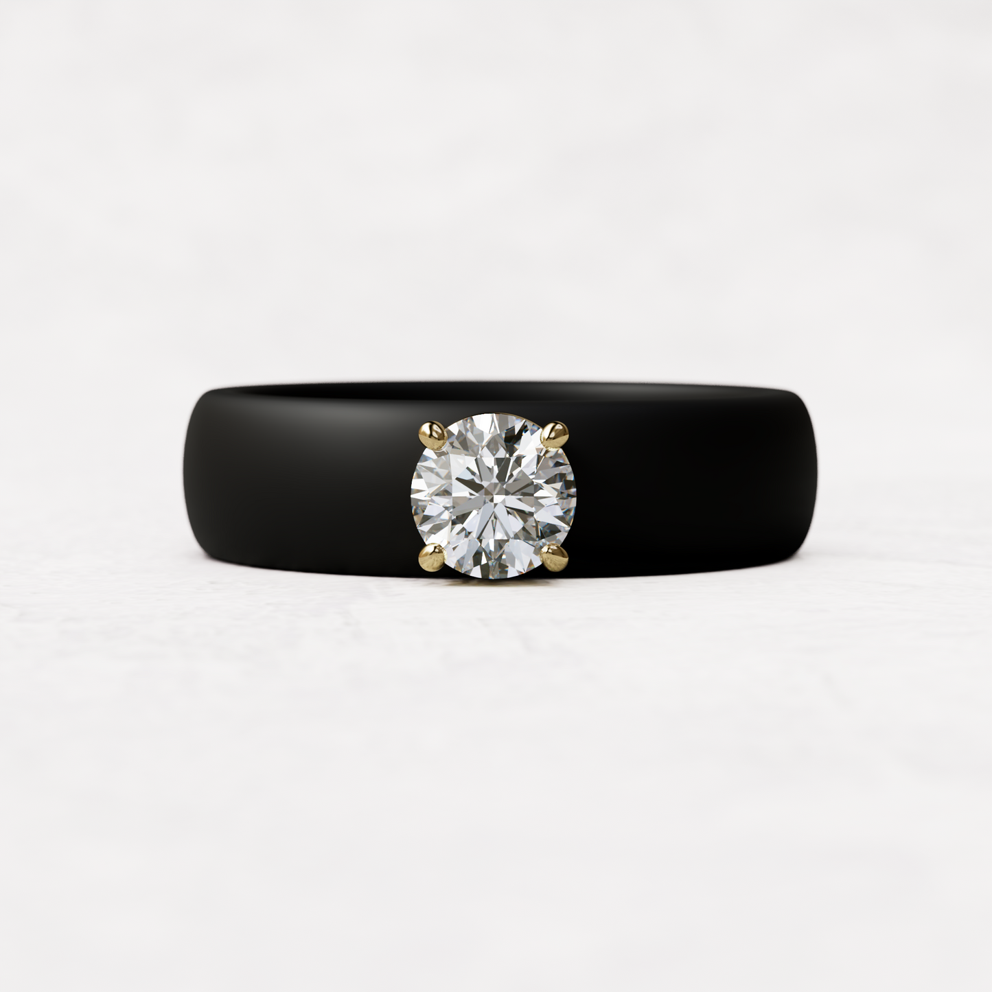 half carat round diamond with black silicone band in 14 karat gold